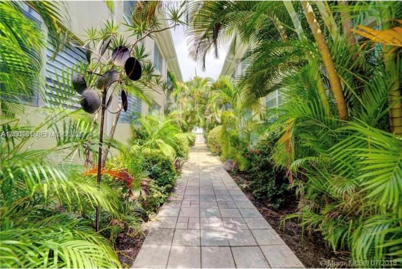 Located in Mid Beach walking distance to park and  Middle school. Residential quiet area.   Enjoy beautiful sunsets
from the pool area.