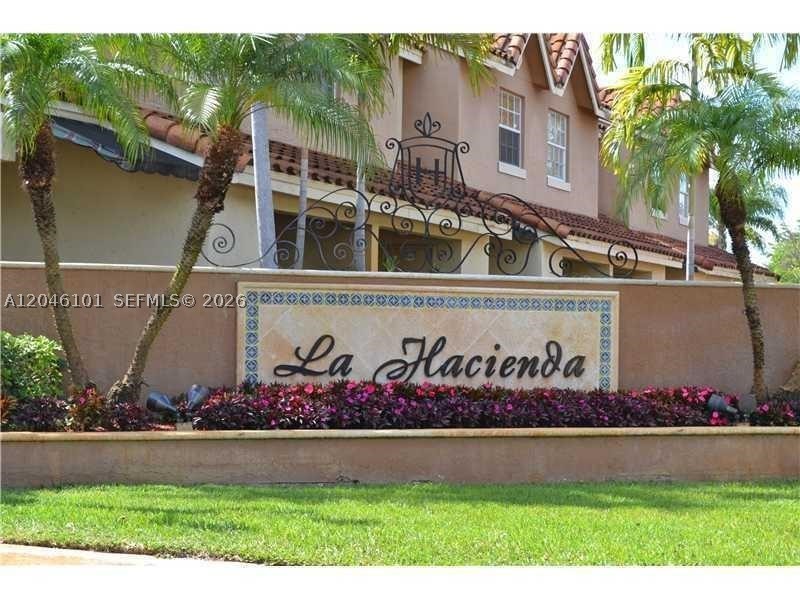 Beautiful Loft with wood/laminate floors and WASHER and DRYER inside unit and great Space for you. TWO ASSIGNED PARKING SPACES! La Hacienda Country Club is gated community with pool, tennis courts, 24 hours security, conveniently close to I-75 and SR-826/Palmetto. 15 days for Association approval; first month's rent and security deposit. NO PETS!