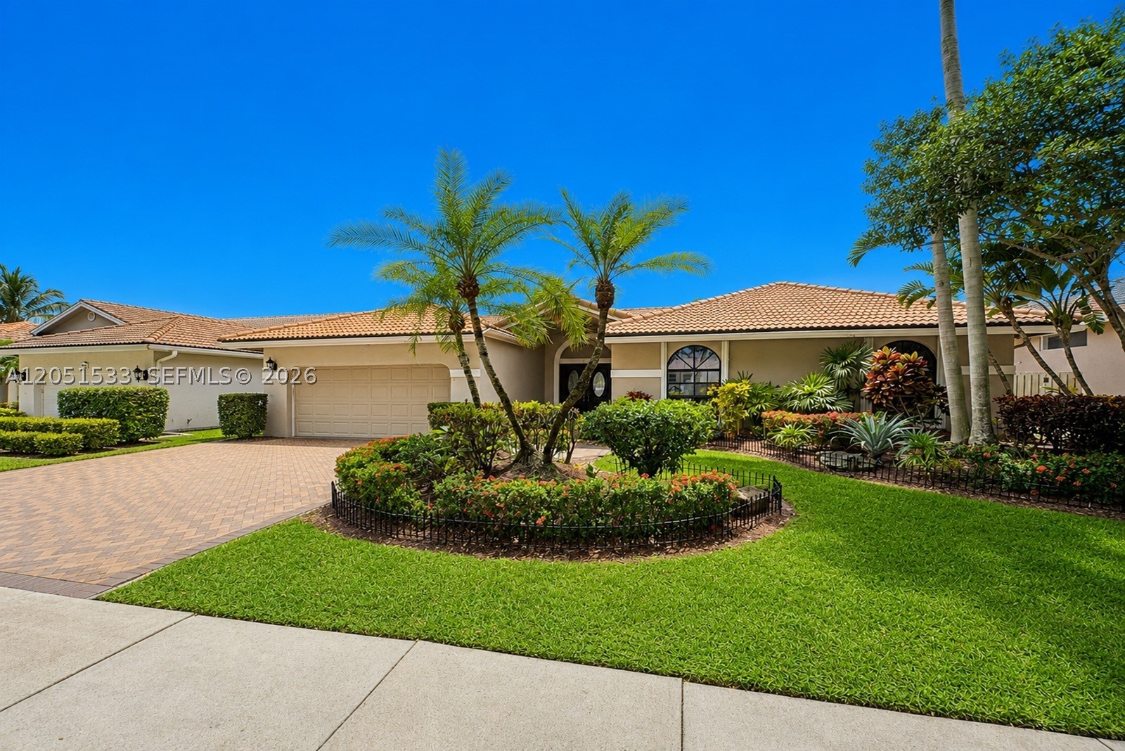 Welcome to Terra Lago of Embassy Lakes, this meticulously maintained 1 story Capri model offers 4 bedrooms, 2.5 bathrooms, and 2,479 sq ft of living space plus a flex room on an 8,250 sq ft lot. This spacious home features soaring volume ceilings, abundant natural light, and a floor plan ideal for everyday living and entertaining. Walk in through double doors to a bright and airy foyer with a floral feature atrium and grand sitting room. The kitchen includes a custom breakfast nook, an instant hot water tap, ample cabinetry, and generous counter space. A formal dining room sits to one side of the kitchen with a cozy breakfast nook leading to an inviting family room on the other. French doors are a feature throughout this home with doors leading to the patio from the family room. The spacious primary suite retreat has a sitting area, and PowerView® automatic shades. Step outside to your screened, extended covered patio, heated and salt chlorinated pool, & relaxing spa, perfect for year-round South Florida living. This backyard is designed to impress. Additional highlights include an extended primary suite, indoor laundry room, and flex room and accordion shutters throughout the home. Embassy Lakes is a gated community with three manned guard gates and access to a clubhouse, community pool, fitness center, tennis courts, pickle ball courts, basketball, and volleyball facilities. Located within the Cooper City school district and close to parks, shopping, and dining.
