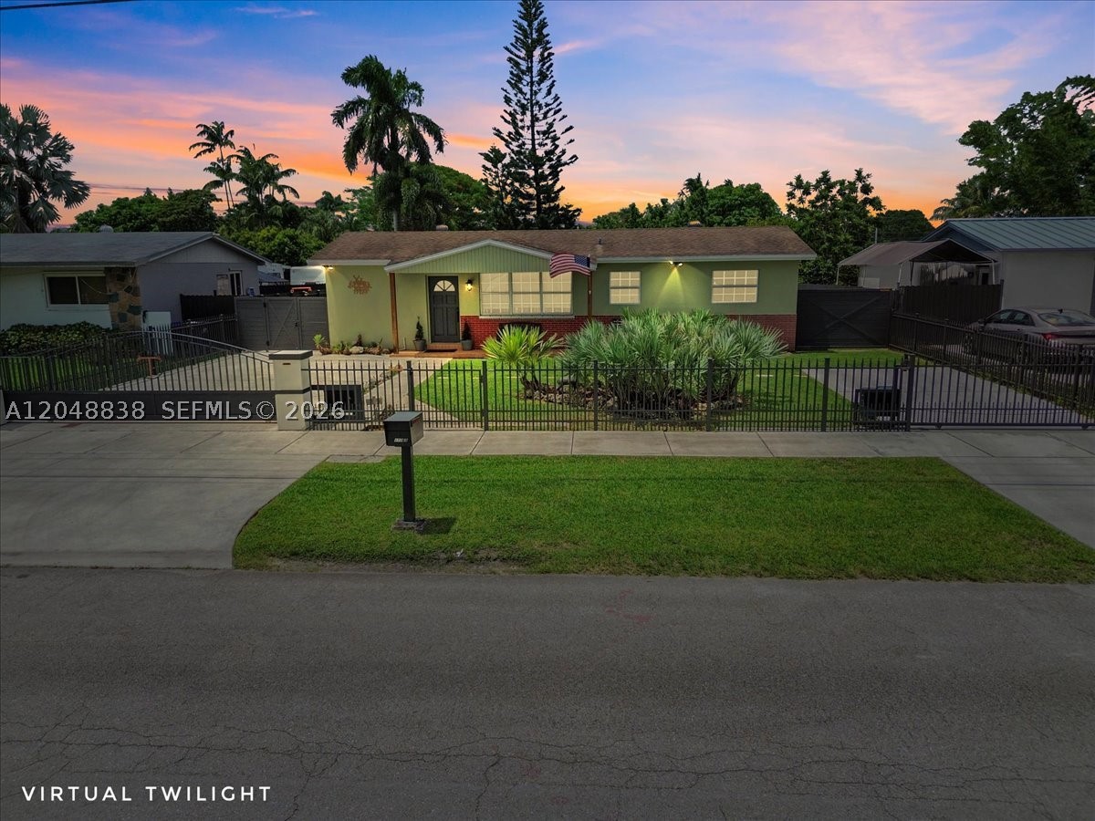 This 3 bedroom, 2 bathroom home sits on an 8,976 square foot lot in Homestead, fully fenced with two automatic gates. The kitchen was recently remodeled, and the layout uses a stacked floor plan that keeps the bedrooms separated from the main living space. Outside, there's a screened patio that was recently re-screened, plus a covered patio with a built in summer kitchen, good for grilling and entertaining without worrying about rain. A container shed adds extra storage or workspace. The AC units were replaced within the last two years. The yard has room to spread out, and the location puts you close to shopping, dining, and the Florida Turnpike for an easy commute. With the size, layout, and outdoor space, it's a solid option as a starter home or for anyone who wants a low maintenance property in Homestead. Contact the listing agent to schedule a showing.