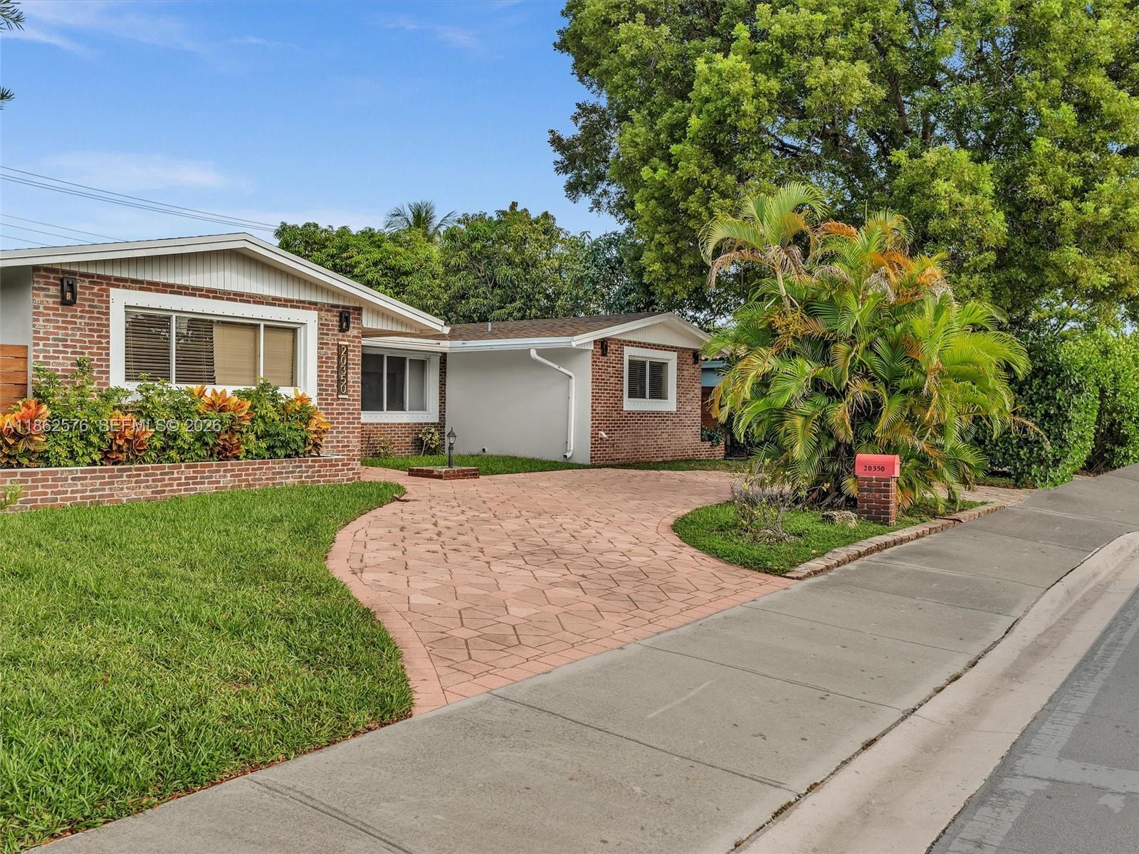 Best deal in Highland Lakes – Gated Community, No HOA! Step into your own tropical oasis in this beautifully updated 4BR/2BA home. Bright, open layout, kitchen featuring granite countertops & wood cabinets, opening to family room overlooking the pool. Covered gazebo with full summer kitchen, BBQ & smart TV, makes entertaining effortless. Pool resurfaced in 2020, deck redone including torch lighting, new sprinkle system, well sprinkle, and large fenced yard offers total privacy. New roof 2024. Prime location near top schools, shopping, dining, Aventura, Sunny Isles, with easy access to I-95, close to Miami & Ft. Lauderdale airports, and walking distance to houses of worship. Don’t miss this incredible opportunity to own in one of the most sought-after neighborhoods! *3D Virtual Tour*
