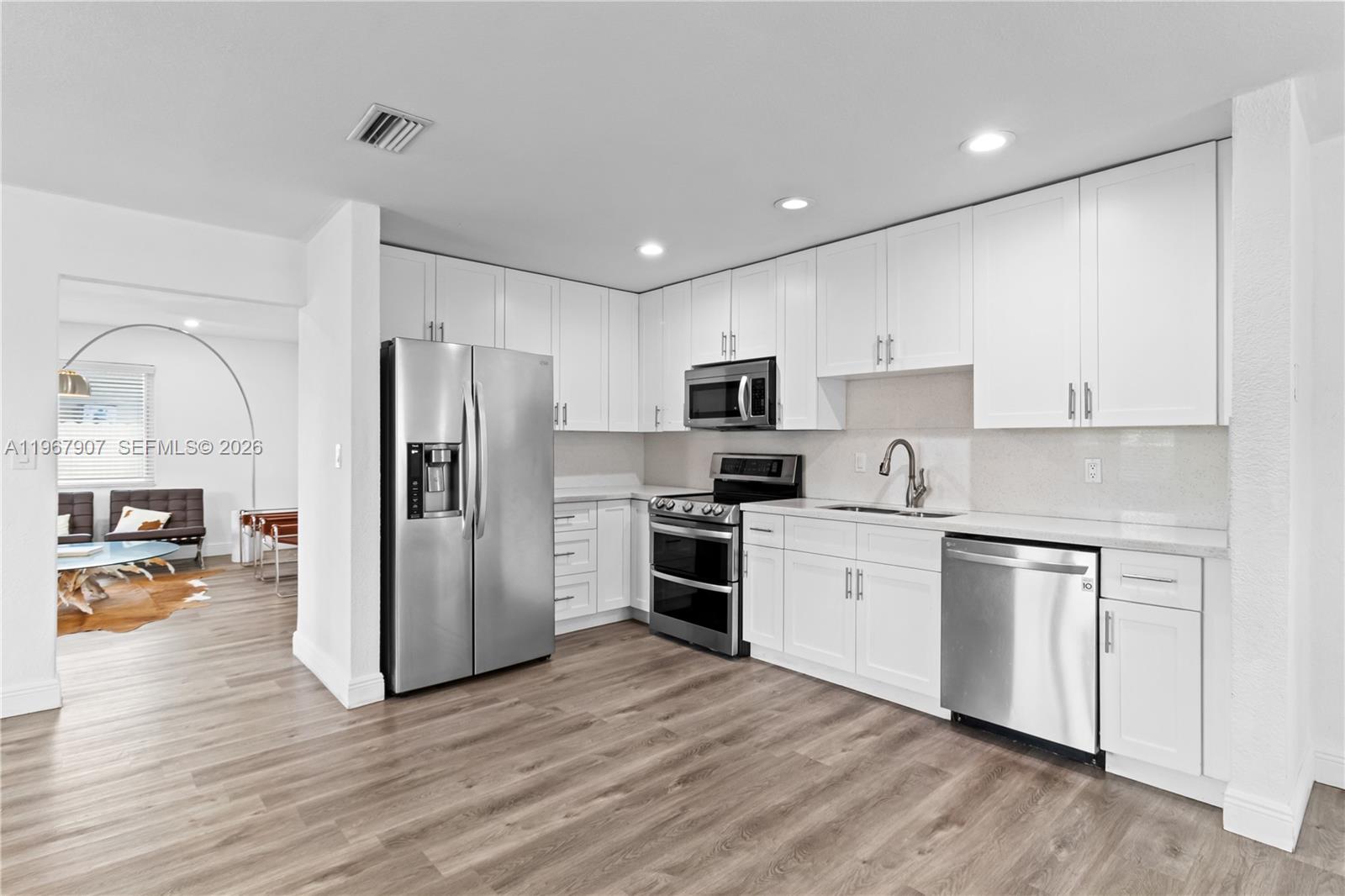 Excellent opportunity to own a fully renovated home in a prime location. This 3-bedroom, 2-bathroom property features many upgrades, including an updated kitchen with quartz countertops and stainless steel appliances, waterproof vinyl flooring, and remodeled bathrooms. Additional improvements include impact windows (2020) and a brand-new roof (June 2025). The home offers a well-designed, open layout with comfortable living spaces throughout. The backyard features a covered patio, ideal for relaxing or entertaining. Conveniently located just blocks from FIU and close to Florida’s Turnpike, restaurants, shopping, and other amenities. A great opportunity in a highly desirable area.