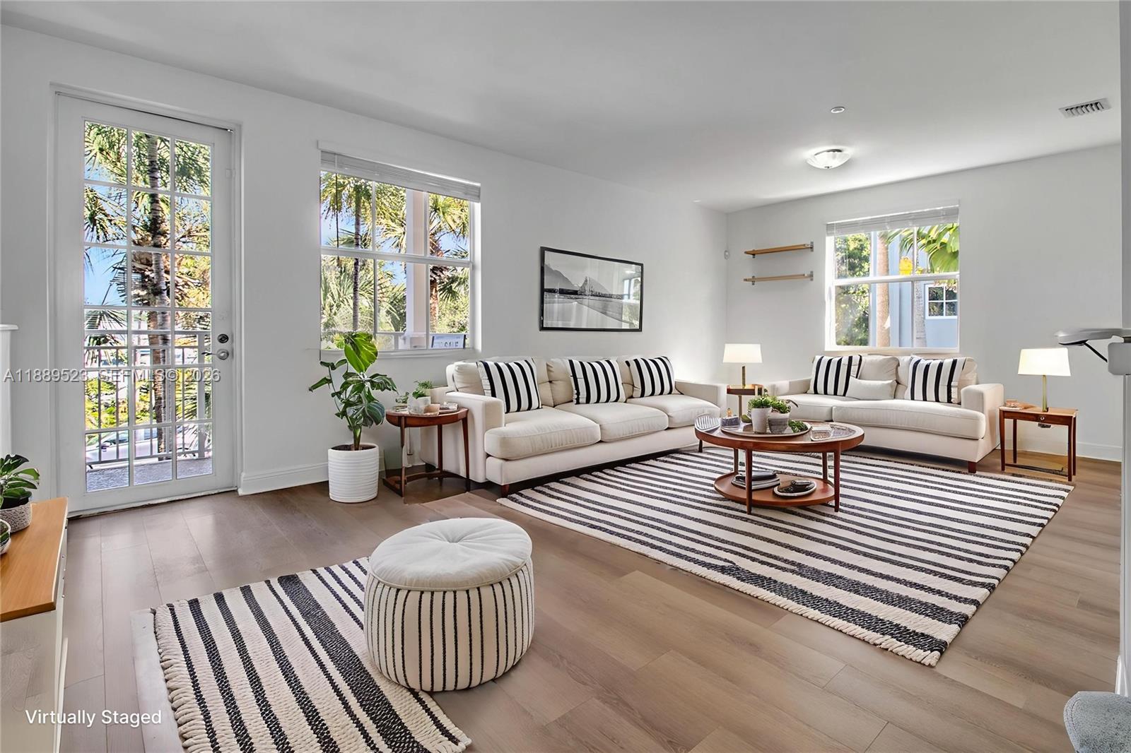 Turnkey Fort Lauderdale investment with immediate $3,300/month income—tenant secured through December 2026. No vacancy risk, no setup, just cash flow from day one. Located in The Village at Sailboat Bend, this nearly 2,000 sq ft 3-bedroom, 2.5-bath townhome offers a stable, low-maintenance hold in a rapidly growing area just minutes from Las Olas, downtown Fort Lauderdale, and the beaches. Open-concept layout with spacious living and dining areas, upstairs bedrooms including a large primary suite, and in-unit laundry. Canal access with kayak launch and close proximity to Riverside Park and marina enhance long-term rental appeal. HOA covers water, roof, exterior maintenance, and landscaping—reducing capital expenses and simplifying ownership. Ideal for investors seeking a 1031 exchange, long-term hold, or income-producing asset in a high-demand rental market.