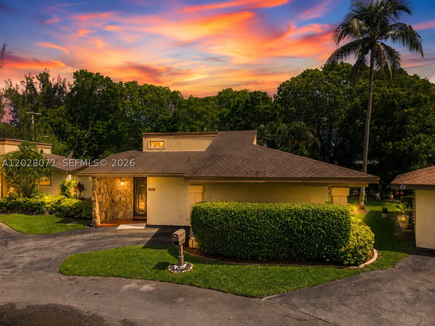 Rare opportunity to own an immaculate, unattached single-story villa in a quiet cul-de-sac within the highly sought-after Villas at Woodmont! This property offers incredible value with one of the lowest monthly HOAs around at just $409/month, which completely covers landscaping, high-speed internet, digital cable, and a coveted appliance warranty program. Perfect for first-time buyers, it also qualifies for low down payment options with as little as 3% down. Spanning a generous 1,949 sq. ft. of bright, open-concept living space, this true 3-bed, 2-bath home features soaring vaulted ceilings, a completely carpet-free interior with tile and rich hardwood floors, and a kitchen equipped with premium Whirlpool Gold stainless steel appliances. Step outside to a private, fully screened-in lanai, and a private covered carport. Complete hurricane protection is already in place with brand-new, double-pane impact windows and a matching impact front door. All of this is situated in an excellent location close to top-rated schools, premier golf courses, shopping, and major highways!