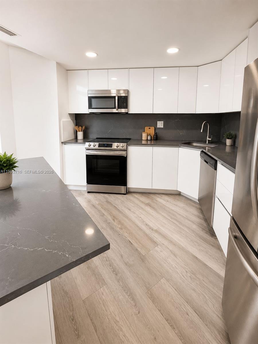 COMMODORE PLAZA CONDO - Residential