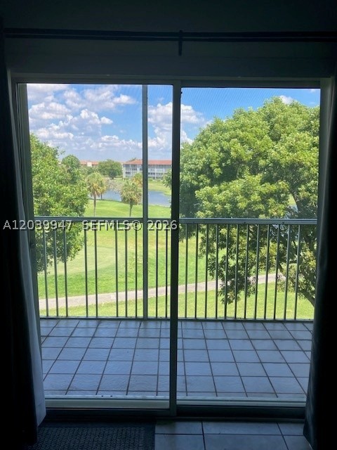 SPECTACULAR GOLF LAGOON VIEW, 1BR/1.5BA CONDO, TILED THROUGHOUT, DISHWASHER, GLASS TOP RANGE, COMPLETE ACCORDION SHUTTERS, RELATIVELY CLOSE TO CLUBHOUSE & POOL. The village is guard gated & patrolled with serene walking trails & relaxing outside greenery, golf, tennis, pools, fitness centers & complimentary transportation. The apartment is conveniently located next to Pembroke Gardens Shops and Pembroke Lakes Mall. It is a verified HOPA 55+ community.