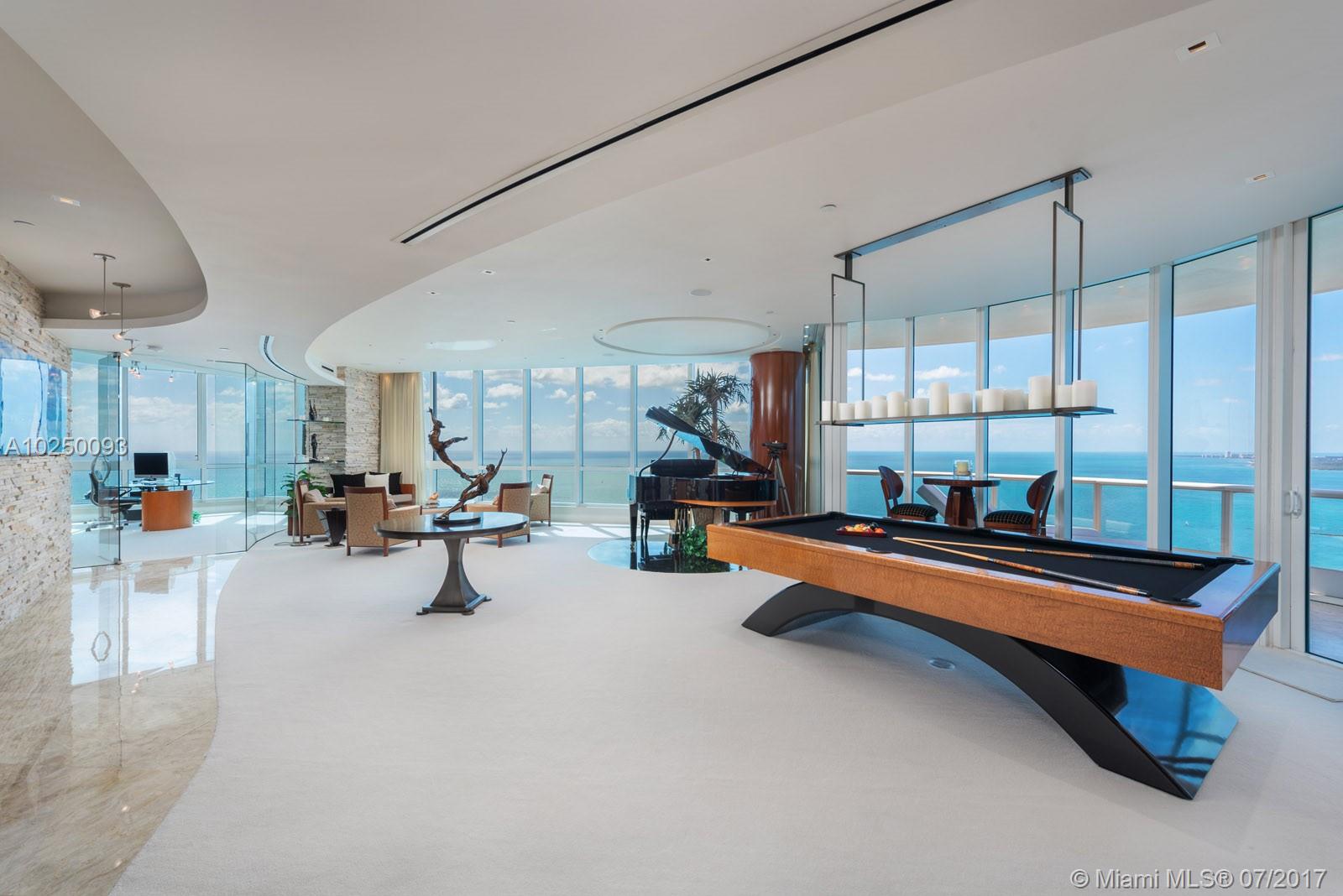Custom, combined unit is a paradise in the sky completed w/highest quality craftsmanship for the most discerning buyer. Located on rarely available 38th floor in the most sought after line in the building, enjoy sweeping views of the ocean, Government Cut, Fisher Island, Downtown Miami & Miami Beach from every room. No expense spared in this one-of-a-kind unit with smart home technology,custom flr plan,wraparound balcony, Gourmet Kitchen w/SubZero/Miele appliances & incredible custom finishes throughout