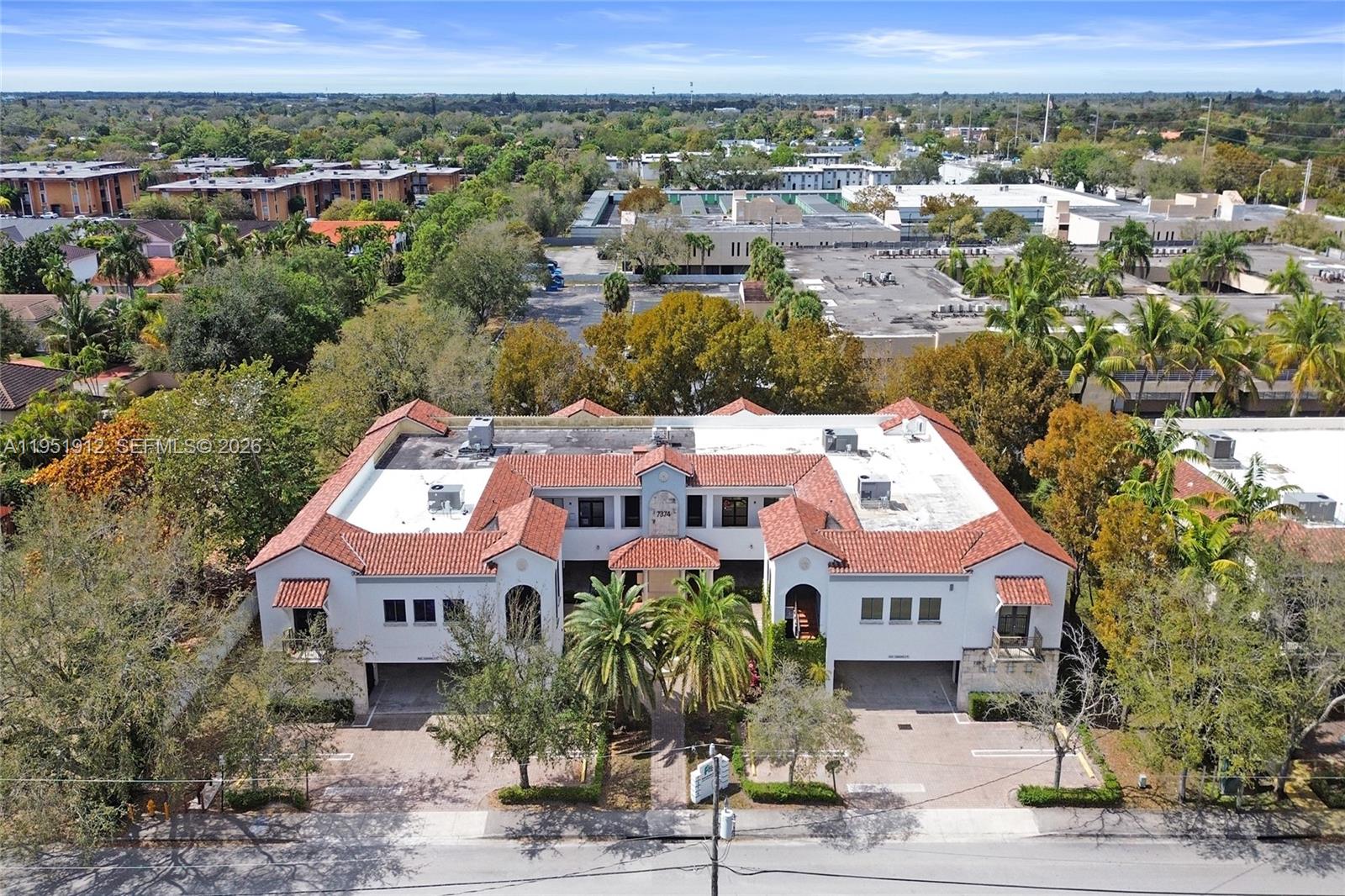 Versatile office condominium ideal for medical or professional use. Features 10 assigned covered parking spaces and is moderately and beautifully decorated. The space is currently divided into two separate offices—one occupied by the owner and the other leased, providing additional income. This flexible layout allows an owner-user to occupy part of the space while generating rental income, or to combine both units into one larger operation. Suitable for a wide range of professional businesses. Total area is 2,756 sq ft, including balcony, as per architect’s plan. Conveniently located approximately 1½ miles from Baptist Hospital, minutes from South Miami, and with easy access to major expressways.