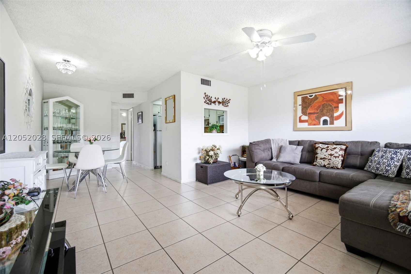WELL-KEPT 1 BEDROOM, 1 BATHROOM CONDO LOCATED ON THE 2ND FLOOR IN THE DESIRABLE 55+ COMMUNITY OF SUNRISE LAKES PHASE 3. THIS UNIT FEATURES A BRIGHT, SPACIOUS LIVING AREA WITH NEUTRAL TILE FLOORING THROUGHOUT AND PLENTY OF NATURAL LIGHT. ENJOY RELAXING MORNINGS ON THE SCREENED-IN BALCONY OVERLOOKING PEACEFUL GREEN SPACE AND MANICURED GROUNDS. CLEAN AND MOVE-IN READY WITH AMPLE STORAGE AND A FUNCTIONAL LAYOUT. COMMUNITY AMENITIES INCLUDE A CLUBHOUSE, 5 SWIMMING POOLS, FITNESS CENTER, TENNIS COURTS, SHUFFLEBOARD, PICKLEBALL, BILLIARDS, LIBRARY, COURTESY BUS, AND AN ACTIVE SOCIAL CALENDAR. CONVENIENTLY LOCATED NEAR SHOPPING, DINING, MEDICAL FACILITIES, AND MAJOR ROADWAYS. QUIET, WELL-MAINTAINED COMMUNITY.