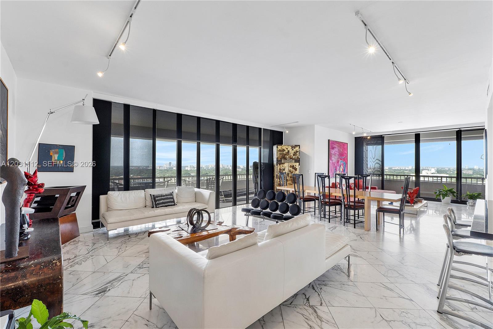 Discover paradise in this rarely available 3 Bedroom, 2.5 Bath Penthouse at Grove Isle! This residence offers 9.5-foot ceilings and breathtaking views of the bay, downtown Coconut Grove & Miami skyline, Dinner Key marina and Grove Isle marina. The spacious footprint consists of 2,424 living area sq. ft, and two balconies with one that extends the entire length of the apartment. The open kitchen has white cabinetry, granite countertops, and stainless-steel appliances along with plenty of cabinets for storage. There are accordion shutters throughout, marble floors in main living areas, a full-size laundry room, and updated bathrooms. The very comfortable primary bedroom has its own en-suite bathroom and a walk-in closet. Enjoy an abundance of natural light along with amazing sunsets all year long. Residents that live here enjoy resort style living with 24hr front gate and security, front desk concierge, valet parking, guest parking, two heated pools and two Jacuzzi’s, gym and yoga studio, Tiki huts and BBQ’s. All located on a 20-acre island with walking path in Coconut Grove. Included in the rent is free Wi-Fi and basic cable. Live just minutes to all of Miami’s best locations including Miami Intl. Airport. Coming soon is Vita’s new club membership!