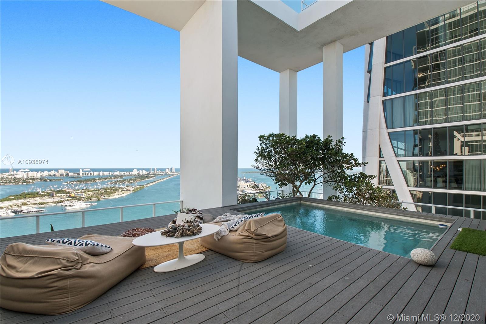 One of a kind 3-level Penthouse. Featuring 24- ft ceilings, private rooftop, plunge pool + 360° panoramic views of Miami skyline, Biscayne Bay, South Beach and Atlantic Ocean. This amazing unit of 5,247 sq.ft (as per owner, see floor plans) was designed by Oppenheim Architecture + Design with  5 bedroom/ 5.1 bathrooms, 2 master suites with private bathrooms, 2 TV rooms, 2 open kitchens, & 4 parking spaces . Enjoy resort style amenities with a 24 hour concierge, valet parking, fitness center and spa. Walking distance to Adrienne Arsht Center, museums & restaurants.  Definitely one of the best penthouses in all Miami!
