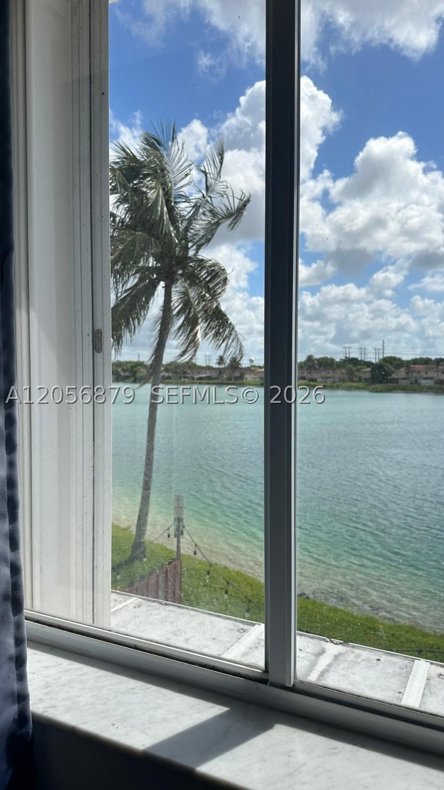 Priced below market for a quick sale! This 3/2.5 is a corner townhouse for extra privacy. Fenced patio facing the lake. Tiled and laminate floors. 2 levels, front parking, greenery, walking community path,  peaceful quiet neighborhood.  Showing Time or call listing agent for more info.