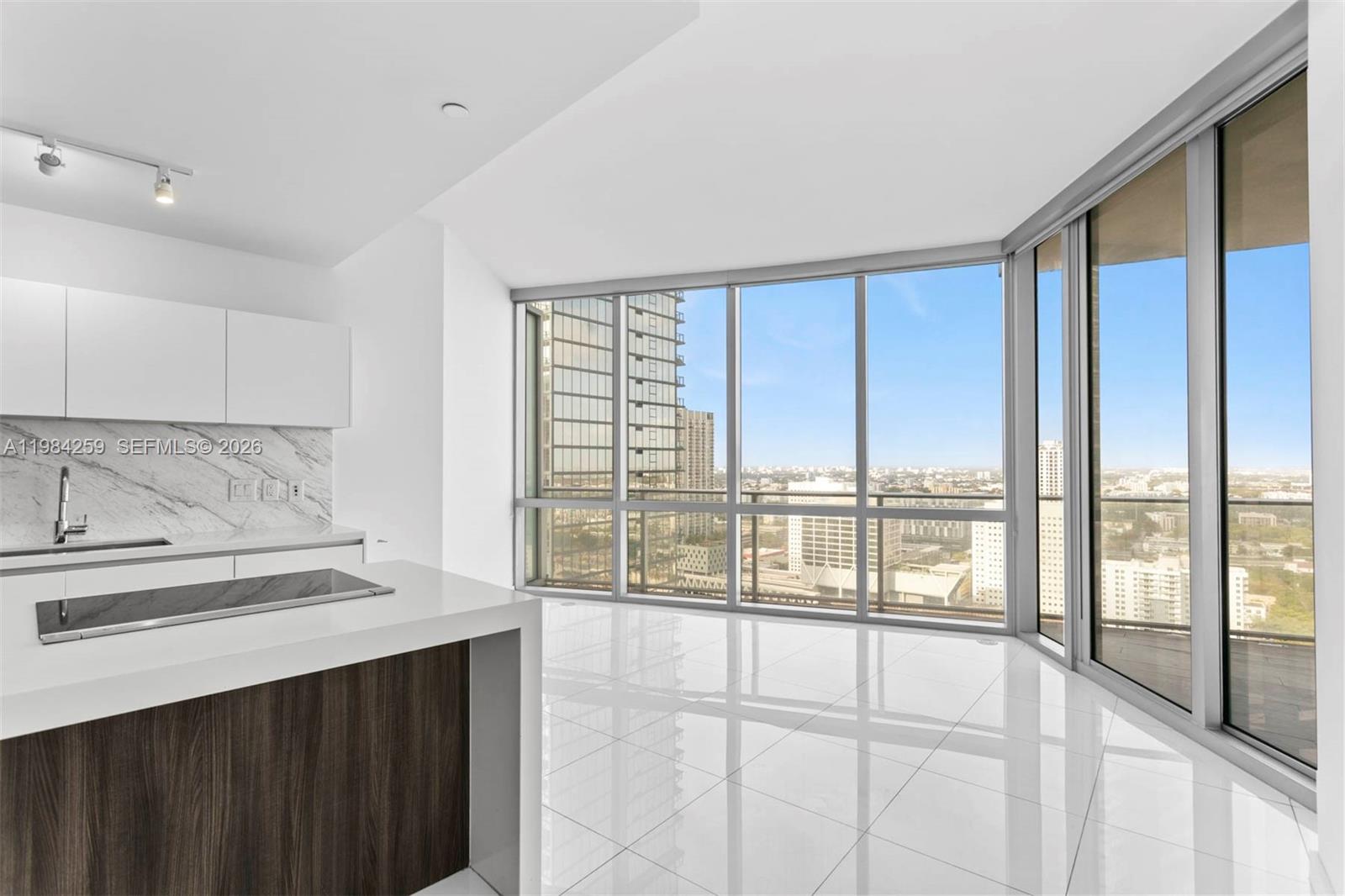 Welcome to Residence 3010 at Paramount Miami Worldcenter! This unique 1-bedroom + den, 2-bath condo features a private foyer, with the elevator opening directly into the residence for ultimate privacy. The spacious, well-designed layout includes a versatile den that can easily be converted into a second bedroom or a private office. The primary suite offers a luxurious bathroom with a soaking tub, separate shower, and dual sinks. Enjoy seamless indoor-outdoor living with a 200 SQFT balcony, perfect for an outdoor lounge. The residence is finished with modern details and Bosch appliances. Two parking spaces are included—one assigned and one valet. Residents enjoy world-class amenities including a soccer field, tennis and basketball courts, resort-style pools, spa, and more—all in the heart of Downtown Miami.