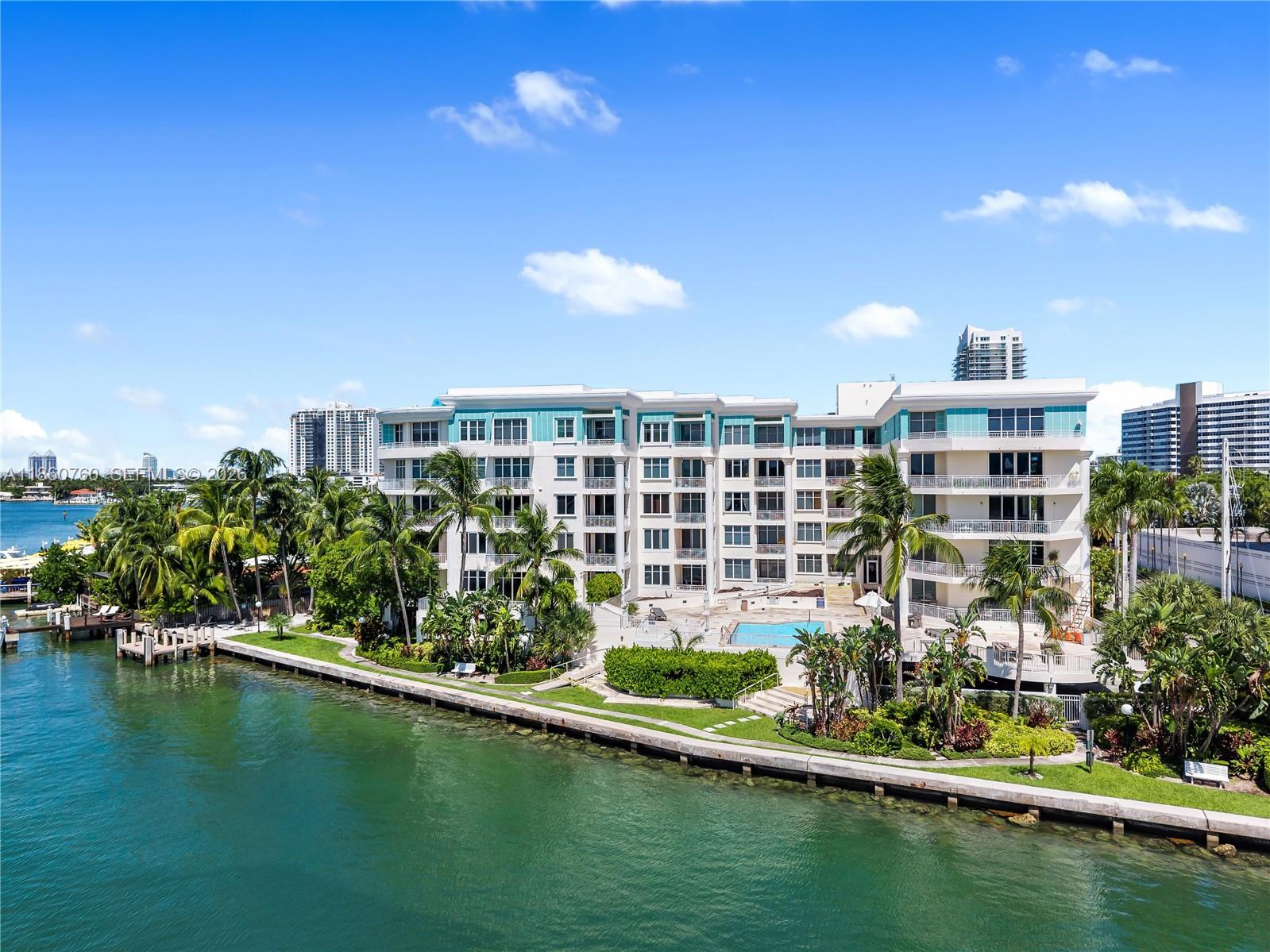 Just reduced! Now the best priced 2 bedroom, 2 bath in the building! Bright and airy second-floor residence, perfectly located on the amenity deck level with steps to the pool, gym, and bayfront dock. Spacious layout with a split floor plan, marble floors, renovated open kitchen and expansive wraparound balcony. Situated on the bay in coveted Belle Isle, this boutique 48-unit building offers 24-hour doorman, stunning bay and Miami skyline views, bike room and secured common areas. Walk to The Standard Hotel, Sunset Harbor, Lincoln Road, Trader Joe’s, or enjoy the scenic park, playground, and dog park just across the street. A rare opportunity to live in one of Miami Beach’s most desirable neighborhoods!