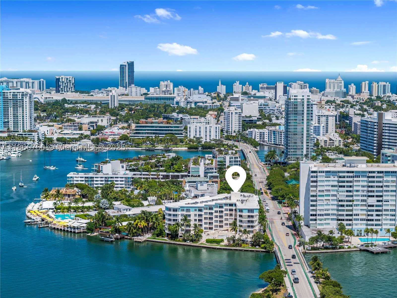 Best priced 2 bedroom, 2 bath in the building and the Venetian Islands.  Bright and airy second-floor residence, perfectly located on the amenity deck level with steps to the pool, gym, and bay front dock. Spacious layout with a split floor plan, marble floors, renovated open kitchen and expansive wraparound balcony. Situated on the bay in coveted Belle Isle, this boutique 48-unit building offers 24-hour doorman, stunning bay and Miami skyline views, bike room and secured common areas. Walk to The Standard Hotel, Sunset Harbor, Lincoln Road, Trader Joe’s, or enjoy the scenic park, playground, and dog park just across the street. A rare opportunity to live in one of Miami Beach’s most desirable neighborhoods!