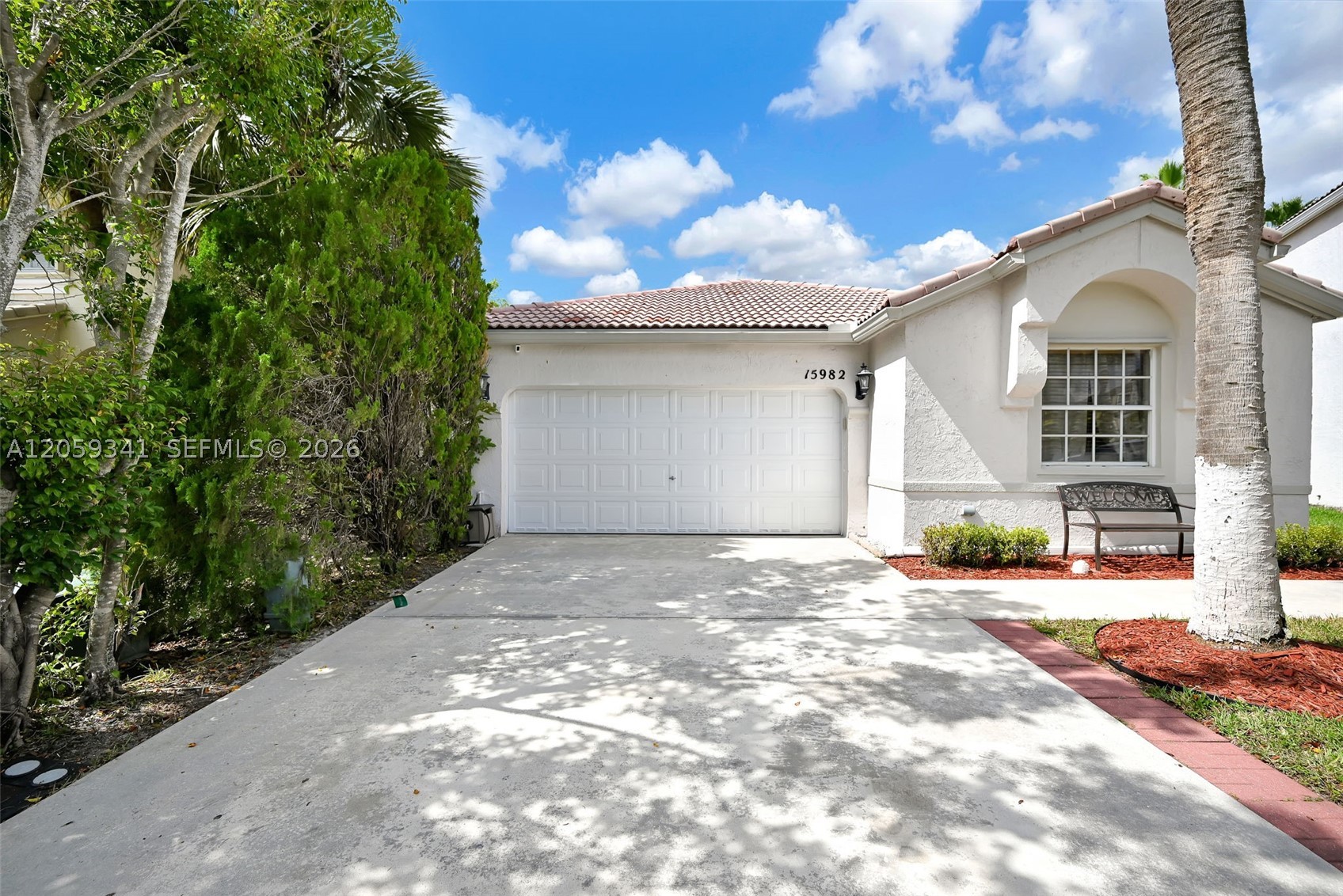 Welcome to this beautifully 3-bedroom, 2-bath single-family home in the desirable Royal Bay at Towngate community. Featuring a bright, open floor plan with vaulted ceilings, this inviting home showcases elegant 24x48-inch porcelain tile flooring throughout. The kitchen was completely remodeled less than two years ago and features Samsung Bespoke appliances along with a custom built-in Miele coffee station and wine cooler. Situated on a generous 6,839 sq. ft. lot, the home offers an expansive, fully fenced backyard with plenty of space for entertaining, play, or creating your own private outdoor retreat. Enjoy the added convenience of a smart sprinkler system installed in 2025 with digital app access. Royal Bay at Towngate offers great community amenities and the convenience of Silver Palms Elementary an A rated school located right within the neighborhood. HOA is only $470 quarterly or equal to $157 monthly.
