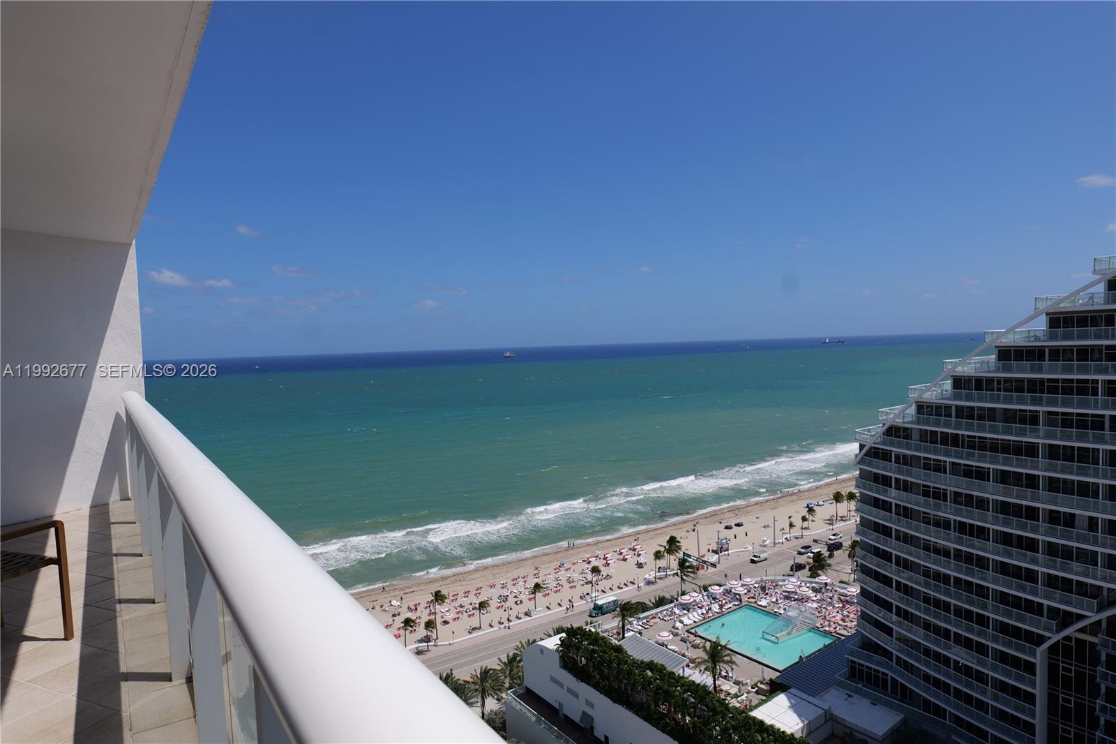 Come enjoy this condo hotel locted on A1A in world famous Fort Lauderdale Beach. This oversized 1 bedroom condo with separate living area, large kitchen , two balconies with South East Atlantic Ocean views at your doorstep.   The hotel has been completely updated with new lobbies, restaurants on site,  full service pool area, spa, roof top bar.   This unit has new furniture package from Hilton hotel.  This unit is part of the hotel program.  Owner can have exclusive use for up to 120 days. Some blackout dates required for hotel program.