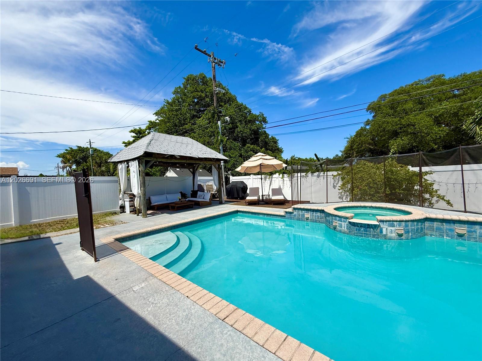 Located on a quiet cul-de-sac street, this beautifully updated 4-bedroom, 2-bath home features modern kitchen upgrades, porcelain floors, and a private 20x40 pool perfect for entertaining and relaxing. Enjoy a spacious driveway with additional parking and electric vehicle charging station capability. Conveniently located just minutes from Aventura Mall, Hallandale Beach, Hollywood, Hard Rock Hotel & Casino, Stadium, shopping, dining, nightlife, and Fort Lauderdale Airport. Easy access to beaches and major highways makes this South Florida home the perfect centrally located getaway.