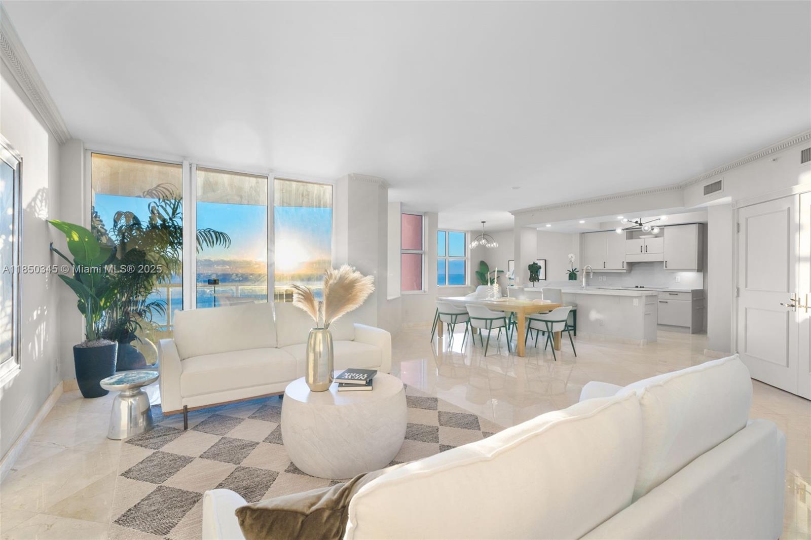 Experience timeless allure of an Italian village where oceanfront charm meets unparalleled elegance. Enjoy a flow through floor plan with ocean and intracoastal/city views. The spectacular sunrises and sunsets of this resort style unit is unmatched. Featuring a fully remodeled 3 bed, 2.5-bath where the third bed is used as a Den/Office. This retreat seamlessly blends with east & west terraces, expansive living & media spaces, private elevator and master suite with spa-like bath & steam room. Enjoy world-class amenities like oceanfront pool with pool/beach side service, private direct beach access, 2-story fitness center, tennis/racquetball courts, clubroom, 24hr valet & security within one of the city's most sought-after addresses. Exceptional opportunity for luxury living and lifestyle!