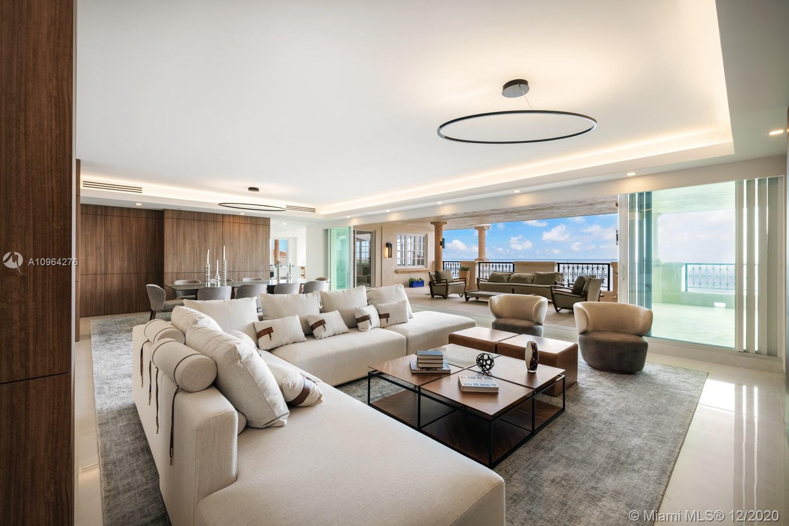 Breathtaking Turnkey Unit on Fisher Island, featuring 5 bedrooms/ 5.5 Bath, Lower Penthouse Residence. The unit boosts 6,170 SF of interior space with a spacious open floor plan. Oversized terrace with unobstructed and dazzling direct ocean views. 2020 renovation with no expense spared, unparalleled in design and finish. The unit features an Italian Mia Cucina kitchen, luxurious Master en-suite with oversized closet, custom wood work throughout, Vantage smart home system and custom bespoke furnishings. The unit is also available with three parking spaces.