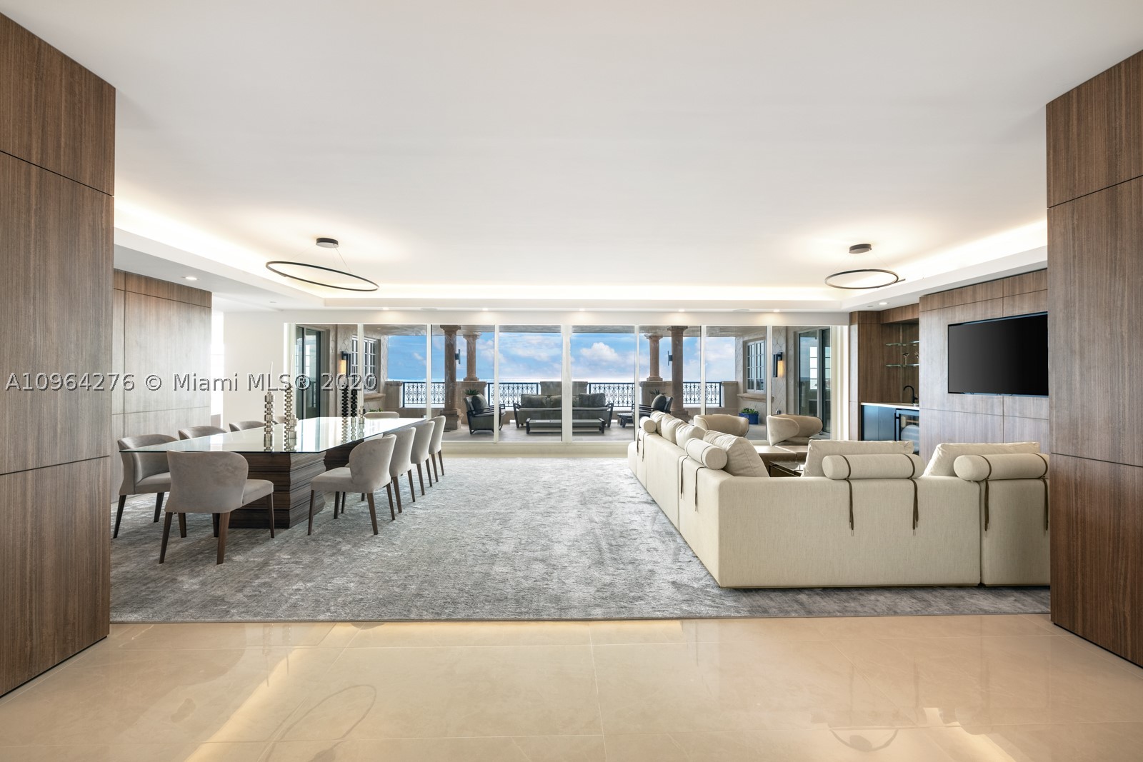 Breathtaking Turnkey Unit on Fisher Island, featuring 5 bedrooms/ 5.5 Bath, Lower Penthouse Residence. The unit boosts 6,170 SF of interior space with a spacious open floor plan. Oversized terrace with unobstructed and dazzling direct ocean views. 2020 renovation with no expense spared, unparalleled in design and finish. The unit features an Italian Mia Cucina kitchen, luxurious Master en-suite with oversized closet, custom wood work throughout, Vantage smart home system and custom bespoke furnishings. The unit is also available with three parking spaces.