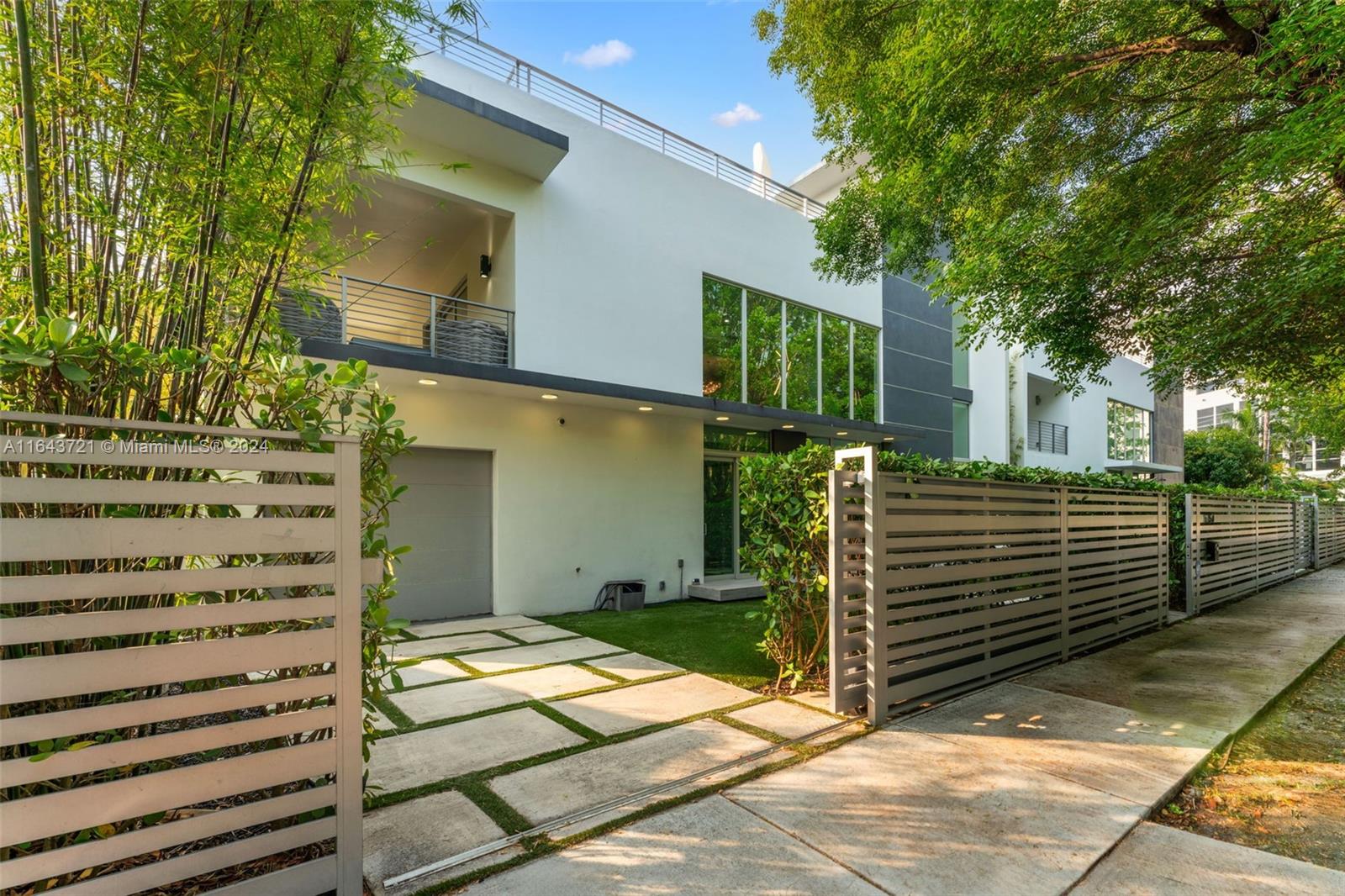 Welcome to Brickell Broadway Villas—where urban luxury meets modern comfort. This 2018-built, three-story 4/4 Twin Home Villa is a true gem in Miami's vibrant Brickell Roads neighborhood. With a total of 3,827 SF, home offers a Ultra modern, open layout with endless natural light, and is surrounded by lush greenery for privacy. Enjoy breathtaking views of the Brickell skyline from your private rooftop pool & an additional patio for unlimited hosting opportunities. This concrete-built home features hurricane-impact CGI windows and doors, a gated entrance, and an oversized garage. Steps from top schools, dining, & just 11 mins from the airport, this villa is perfect for those seeking sophistication and convenience. Perfect for families, executives, & entertaining. Also avai for rent $20,000.