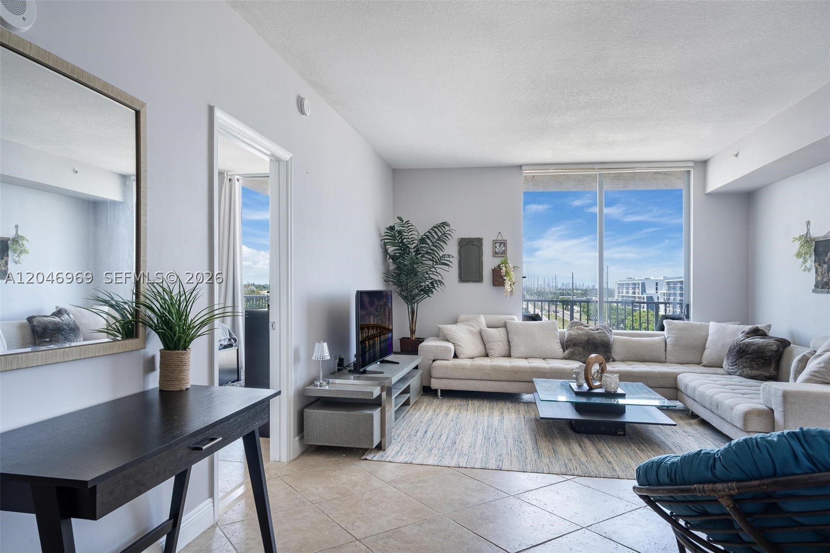 2 bedroom 2 bathroom almost 1200 square feet RARELY AVAILABLE northeast CORNER unit; split bedrooms, each with en suite bathroom, separate living and dining areas, and a balcony that spans the entire unit with views to the Fort Lauderdale skyline. stacked washer dryer in unit. Amenities: pool, gym, rooftop party room, convenience store, 24 hour security and valet, management on site. Bike storage available. Mini mart on 1st floor. PET FRIENDLY up to 2 pets 35 lb each. INVESTORS: rent right away, 90 days minimum, 4x per year. AMAZING LOCATION: Hollywood & Dixie very close to fantastic schools, restaurants, dance and yoga studios, shopping, and of course, the beach and ocean!