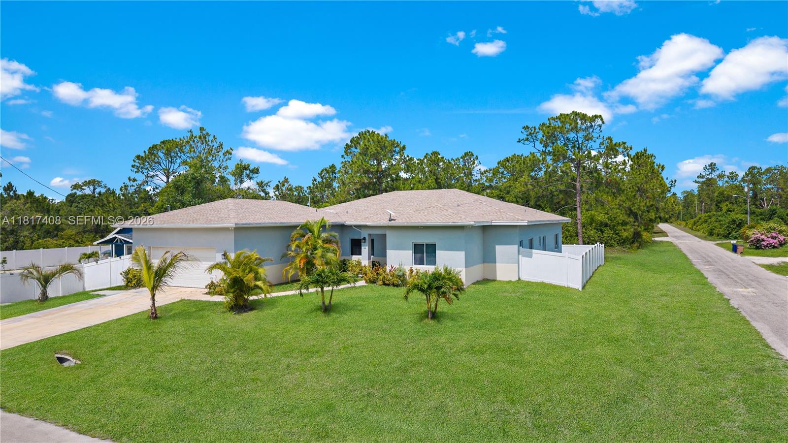 LOCATED IN LEHIGH ACRES FL, Charming Dual-Residence Property with Airbnb Income Potential. Discover this exceptional property offering both comfortable living and income-generating potential. The main residence features a spacious 4-bedroom, 3-bathroom home with an office a 2-car garage, perfect for families or those who enjoy extra space. Designed for comfort and convenience, the home boasts generous living areas, a modern kitchen, and private bedroom suites. In addition, a separate 2-bedroom, 1-bathroom cottage provides the ideal opportunity for short-term rental income. Currently listed on Airbnb, the cottage generates an average of $2,500 per month, making this an excellent investment opportunity or an ideal space for guests, extended family, or even a home office,HALF ACRE LOT.