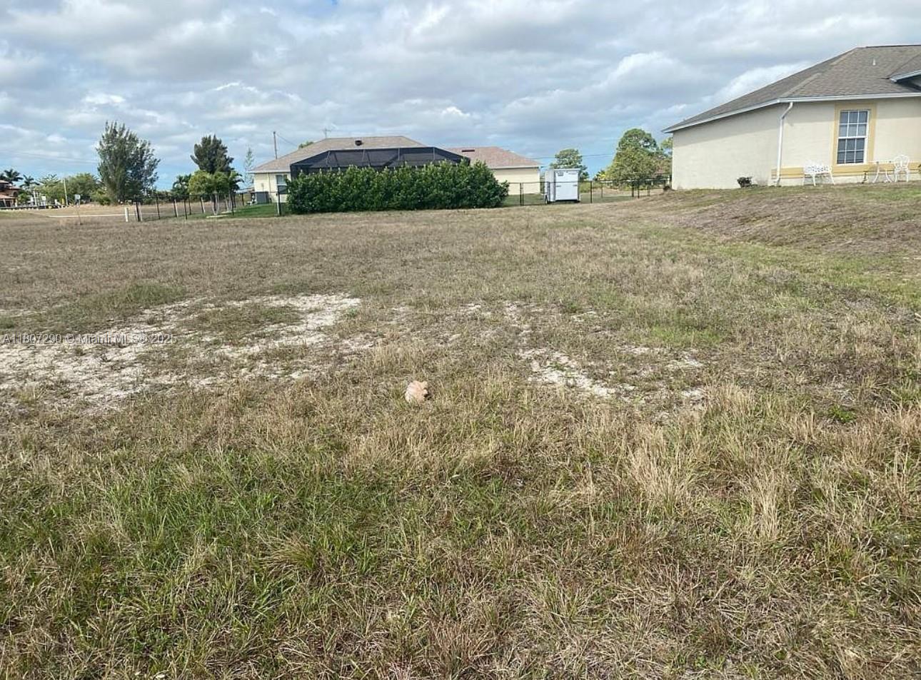 “OWNER FINANCING” Price Improved ! Beautiful clean and READY-TO-BUILD LOT located in one of the FASTEST-GROWING AREAS of Cape Coral. Nestled in a quiet community with NO HOA, this property is PRICED TO SELL QUICKLY. Centrally positioned near El Dorado Blvd. and the booming Pine Island Corridor, just minutes from Coral Oaks GOLF COURSE, local parks and dog parks, and the beautiful Cape Coral waterways. Close to TOP-RATED SCHOOLS, this lot is perfect for your DREAM HOME or as a SMART INVESTMENT.