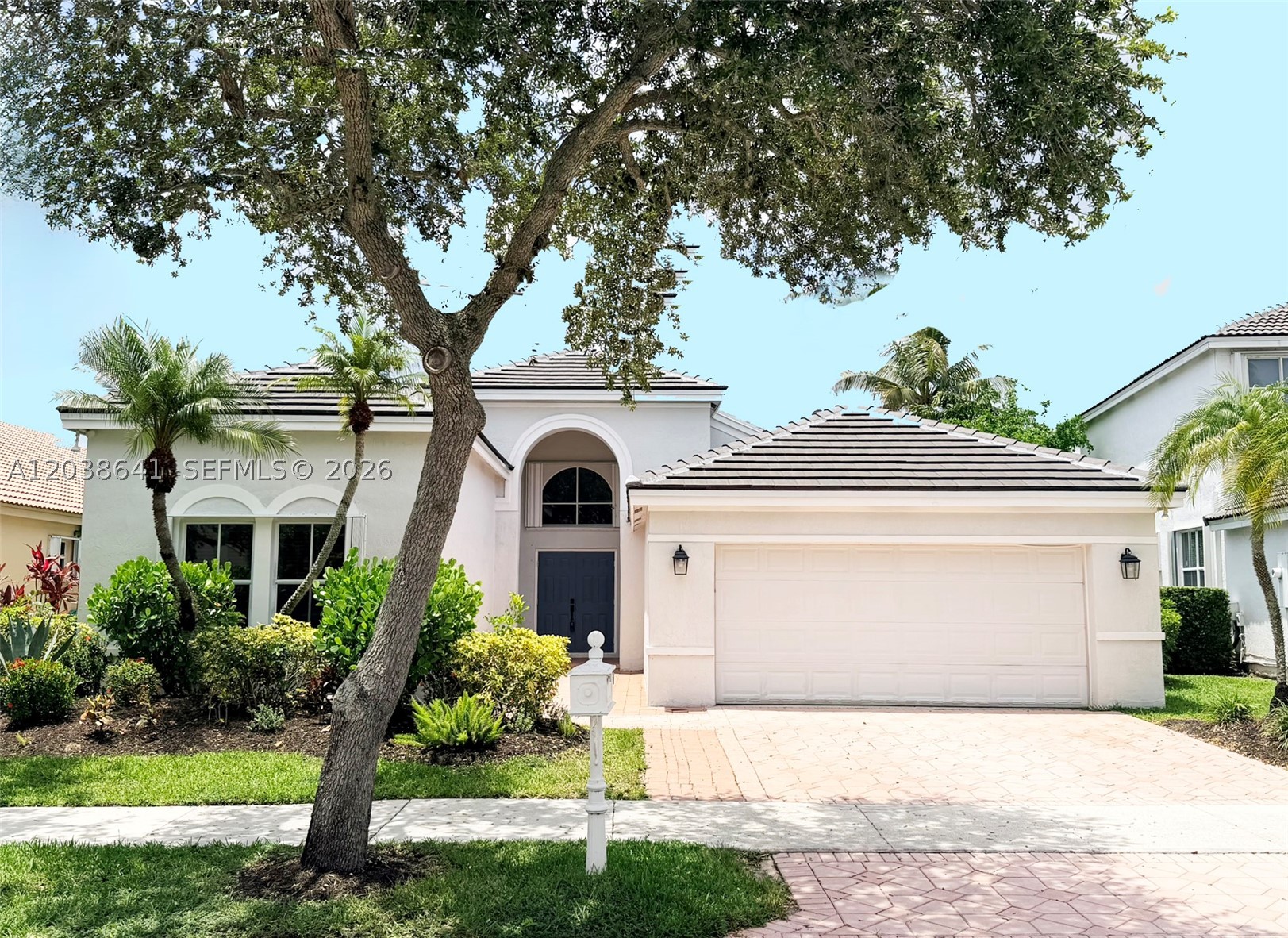 NESTELED ON A PRIME, QUIET CUL-DE-SAC STREET, THIS GATED WESTON LAKEFRONT CONTEMPORARY FOUR-BEDROOM TWO AND A HALF BATH GEM SITS ON A PRIME QUIET CUL-DE-SAC STREET LOT. THIS GATED WESTON CONTEMPORARY FOUR BEDROOM TWO & ONE-HALF BATH BEAUTY OFFERS AN EXCEPTIONAL LIFESTYLE. JUST MINUTES AWAY FROM VIBRANT WESTON TOWN CENTER, THE WORLD-CLASS SAWGRASS MILLS MALL AND THE FORT LAUDERDALE INTERNATIONAL AIRPORT,THE FALLS COMMUNITY BOASTS RESORT-STYLE AMENITES & TOP-RATED A+ SCHOOLS. AS YOU STEP THROUGH THE FRONT DOOR, YOU'RE GREETED BY A LIGHT AND BRIGHT FLOOR PLAN WITH BREATHTAKING VIEWS OF THE LAKE, AS WELL AS THE INVITING POOL AND PATIO AREA, WHICH ARE ALSO ENJOYED FROM THE FAMILY ROOM AND MASTER BEDROOM. THE FUNCTIONAL SPLIT BEDOOM FLOOR PLAN OFFERS MARBLE FLOORS AND VOLUME CEILINGS, A LARGE MASTER BEDROOM SUITE WITH A LUXURIOUS MARBLE MASTER BATHROOM WITH A SEPARATE ROMAN TUB AND SHOWER AND TWO SEPARATE VANITIES. THE BEAUTIFULLY UPDATED GOURMET KITCHEN IS ADORNED WITH RICH WOOD CABINETS, A STYLISH BACKSPLASH, UPDATED STAINLESS STEEL APPLIANCES AND GRANITE COUNTERS ALL OPENING TO A HUGE FAMILY ROOM WITH BUILT IN ENTERTAINMENT UNIT. ENJOY THE OUTDOORS WITH YOUR PRIVATE CUSTOM SPARKLING POOL AND KOOL DECK PATIO ALL OVERLOOKING THE SERENE LAKE. EXTRA FEATURES INCLUDE ACCORDION HURRICANE SHUTTERS, A TWO-YEAR NEW UPDATED BARREL TILE ROOF, ALMOST NEW CENTRAL AIR CONDITONING SYSTEM, BEDROOM CLOSET ORGANIZER SYSTEMS, PADDLE FANS, ALARM AND NEAR A POOL, PLAY AREA, SCHOOLS AND EXPRESSWAY.