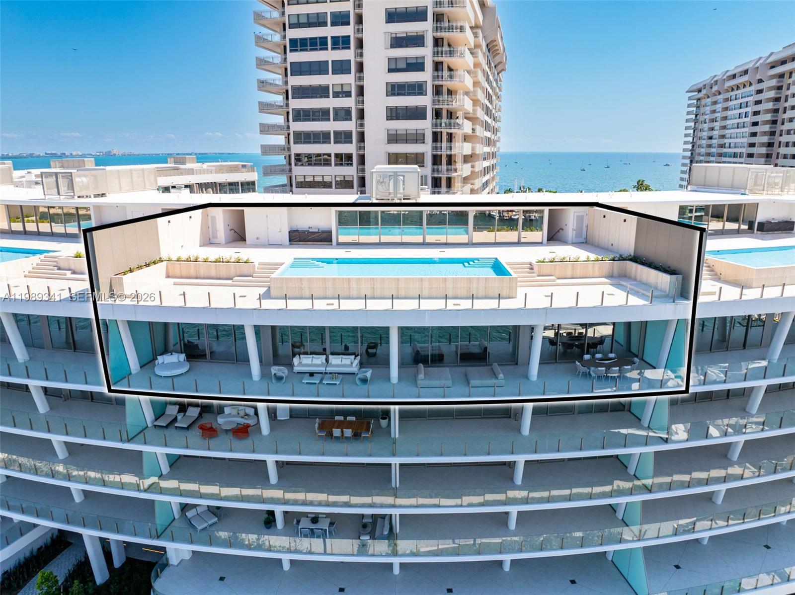 Luxurious, 2-level Penthouse with a huge rooftop and 40-ft infinity pool on private Grove Isle. Finished to perfection and offered turnkey with sophisticated Artefacto furniture, this opulent residence features beautifully appointed 7,000-SF interior plus 5,600-SF of exterior spaces. Immense living areas with 11-ft ceilings seamlessly connect with a 13-ft deep terrace capturing water and Miami skyline views. Sleek Molteni kitchen opens to formal dining area, while elegant spiral stairs take you to a second level, entertainment-scale indoors and rooftop. Exquisite primary suite with lavish marble bath and 2 closets, dedicated elevator, Crestron control, Lutron lighting, Barausse doors. VITA at Grove Isle is a waterfront sanctuary developed Ugo Colombo, located moments to Coconut Grove.