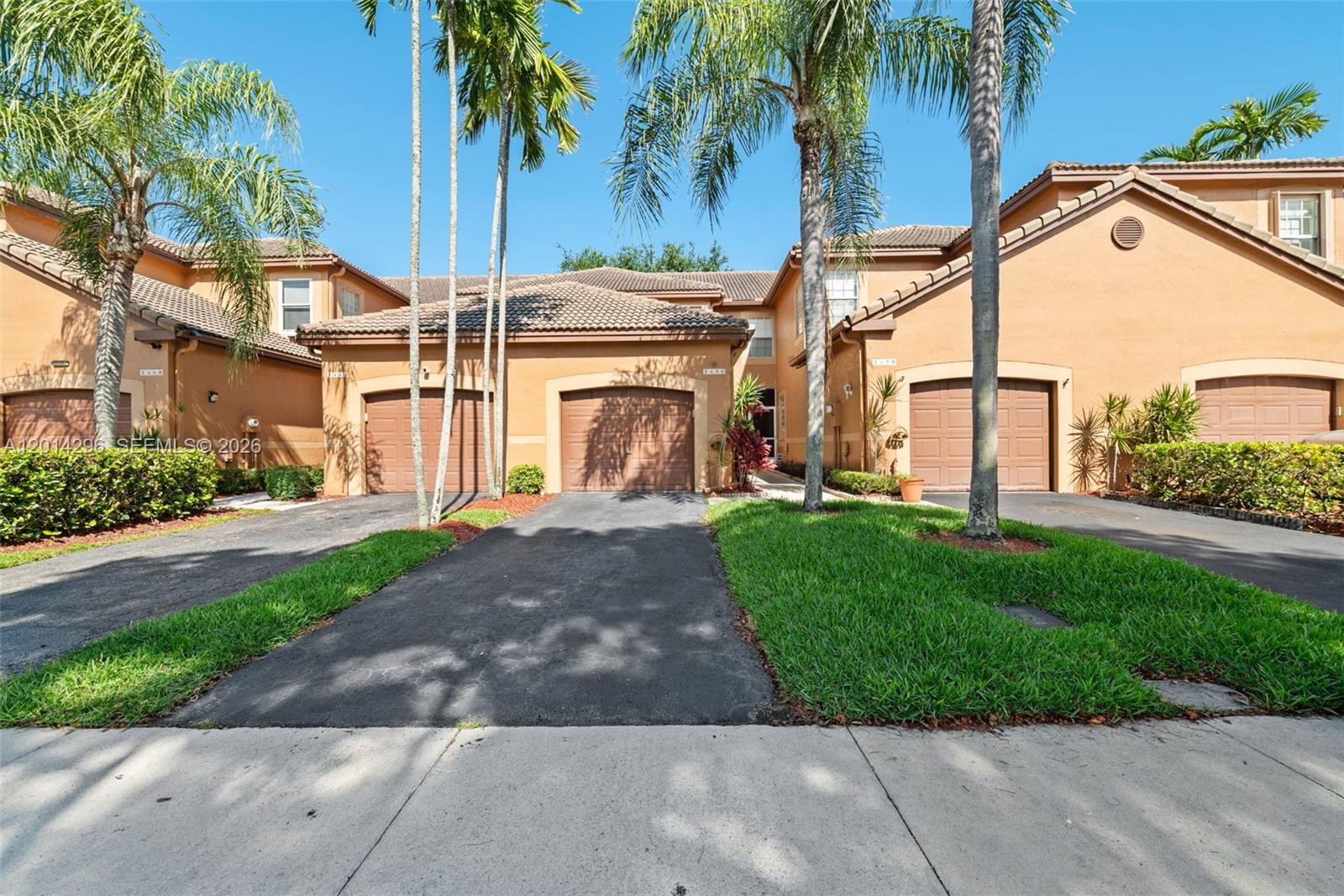 Located in the established community of San Sebastian in the highly desirable City of Weston, this well-maintained 2 bedroom, 2.5 bath home offers peaceful water views and exceptional privacy with no neighbors behind — the perfect setting to relax and enjoy the backyard birdlife. The friendly, quiet community features a community pool and beautifully maintained surroundings. Inside, solid light oak flooring and Plantation shutters add timeless, high-end appeal, while the kitchen offers a convenient coffee/wine station perfect for entertaining. Spacious storage areas under the stairs provide added functionality, and accordion shutters offer peace of mind. Complete with a one-car garage and several nearby guest parking spaces.  2 year old AC and updated appliances. Ideally located within walking distance to Weston’s top-rated schools and just minutes to I-75, I-595, I-84, shopping, restaurants, and Weston Town Center.