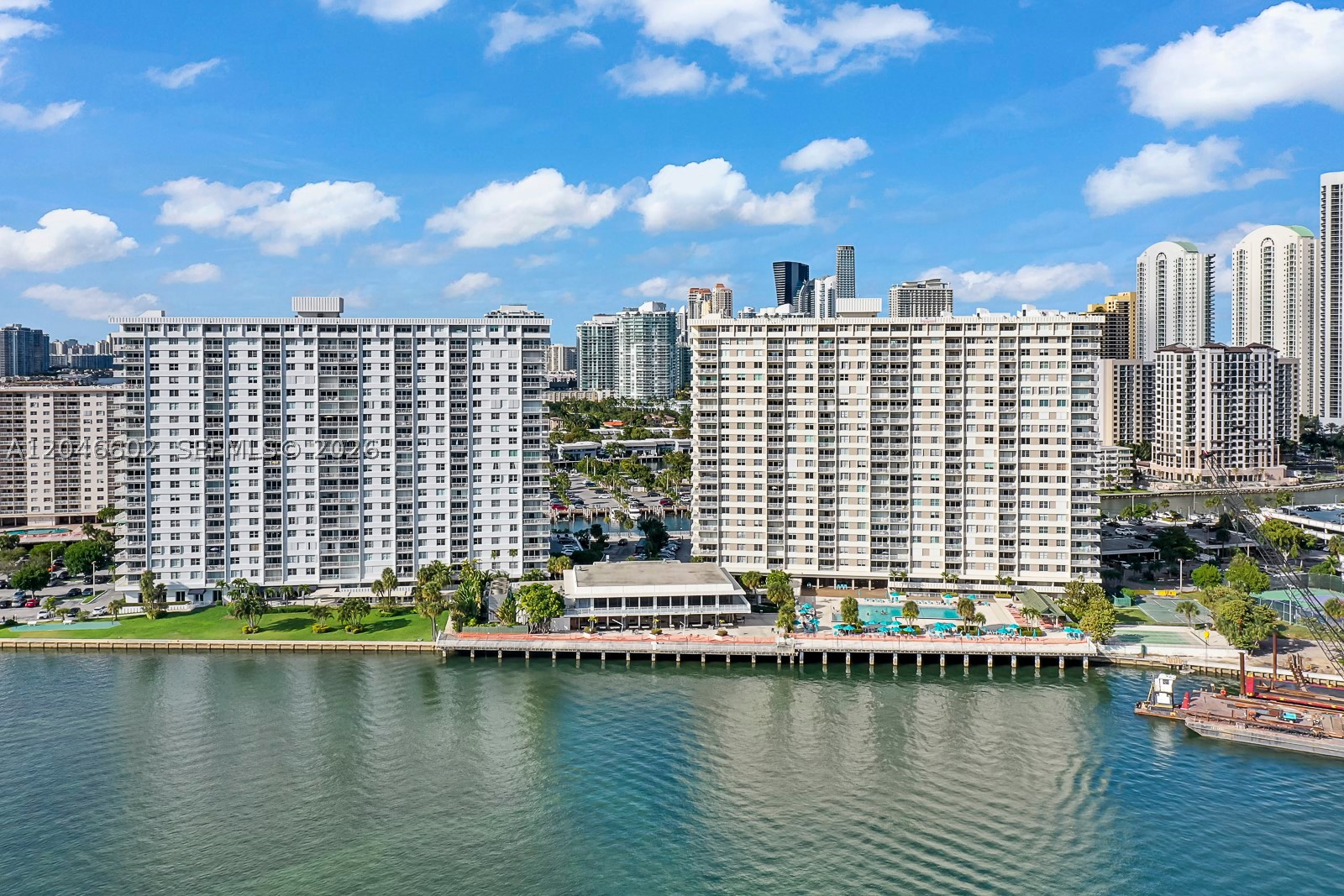 Stop LOOKING! Paradise is here with this stunning one bed one bath condo with unobstructed Million dollar views of the Intracoastal and Miami Skyline. Walking distance, only about 600 ft to the beautiful Atlantic Ocean waters. This unit has been renovated with a Fabulous kitchen, with high-end stainless steel appliances, quartz countertops, and under cabinet lighting. Bathroom has been completed renovated with glass shower doors and porcelain floors. The building has many amenities including Restaurant, Fitness center,Pool,Sauna and more. 24 hour guard gated community. Conveniently located near shopping centers, supermarkets, restaurants and the shops at Bal Harbor are only an 8 min drive away! Call for an appointment to paradise.