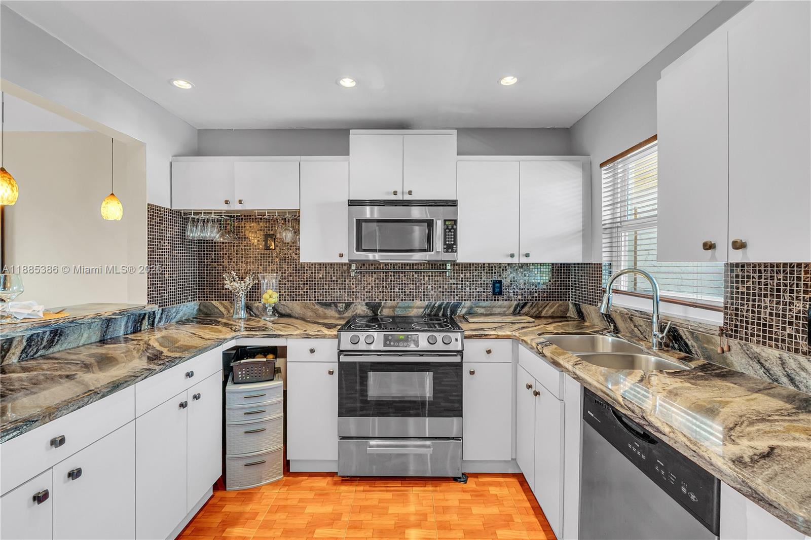 55+ Updated 2-bed/2-bath Condo W/ Full Impact Windows Front And Back. Enclosed Patio W/ Hurricane-impact Glass, Giving Uninterrupted Waterfront Views. Bright Open Layout W/ Tile Floors, Updated Kitchen W/ SS Appliances, Modern Baths, And A Primary Suite W/ Walk-in Closet And En-suite Bath. Upgrades Include New Electrical Panel, 2024 WH, 2017 A/C, And A Building Appliance Maintenance Warranty. In Highly Sought Sunrise Lakes Phase 3, Known For Excellent Administration, With Golf, Tennis, Pools, Gym, Sauna, Racquetball, Ping Pong, Theater, Bingo, And More. Cable, Water, And Exterior Insurance Included. Requirements: 55+ (Both), $24k Income Each, 670+ Credit, 20% Down Financing Or 10% Down Cash, No Grantors, And A Refundable Six Months Of Maintenance In Escrow For One Year. No Assessments.