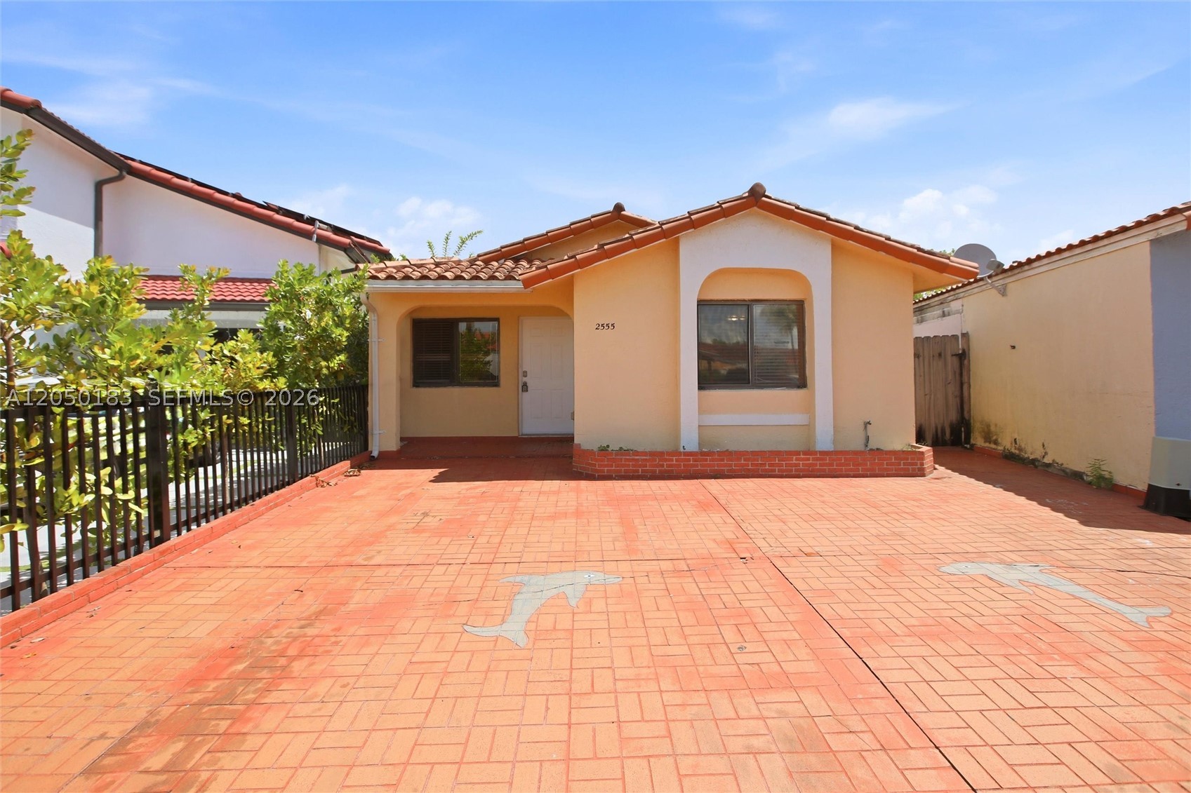Welcome to this beautifully maintained lakefront home in the highly desirable and guard-gated community, El Prado by the Lake! This inviting residence features attractive brick exterior accents, a spacious paver driveway with ample parking, and fresh interior paint that creates a bright, move-in-ready atmosphere. Inside, you'll find durable luxury vinyl plank flooring and ceiling fans throughout, offering both style and comfort. The kitchen is equipped with stainless steel appliances, rich-colored maple cabinetry, and plenty of storage, making it perfect for everyday living and entertaining. Enjoy peaceful lakefront views from your own backyard while being conveniently located near shopping, dining, schools, and major roadways. Don't miss this wonderful opportunity to own a charming waterfront home in one of the area's most sought-after neighborhoods!