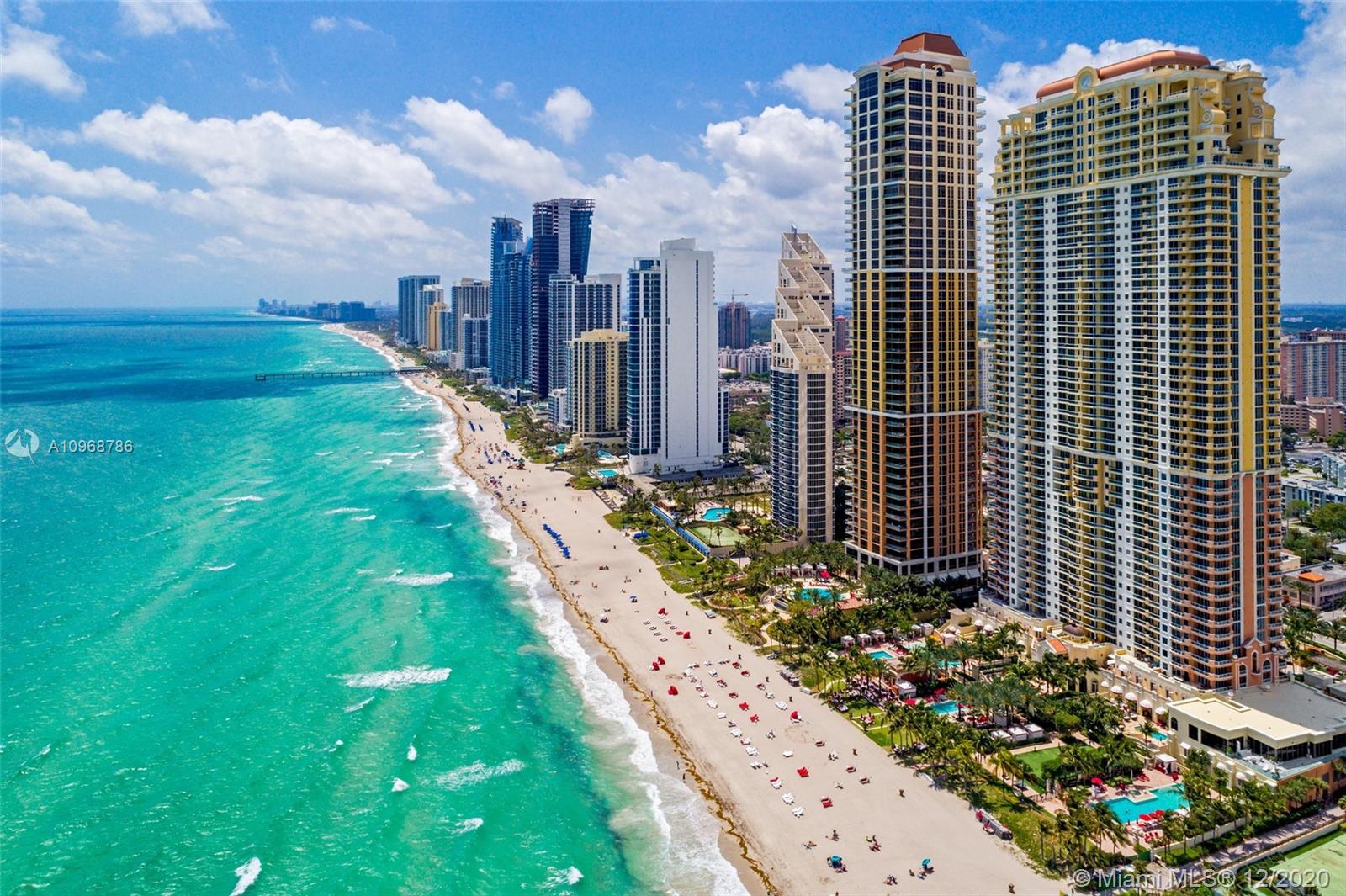 Luxury condo living redefined in South Florida at The Mansions at Acqualina. Residence #2002 is a luxurious beach getaway. Breathtakingly beautiful, featuring 4,609 SF & 3bed/6.5 baths, this direct ocean front residence has preferred SE sun, boasting two large terraces with private jacuzzi & summer kitchen. Private entry foyer. Spacious master with direct ocean views, his & her master baths with crocodile embossed leather closets. Gas fire place. Marble floors. Enjoy the finest amenities & luxury service from the Acqualina brand including Rolls Royce Car, complimentary breakfast, spa & hammam, & beach club & services from the Forbes 5-star Acqualina Resort, voted by US News best hotel in US in 2019.