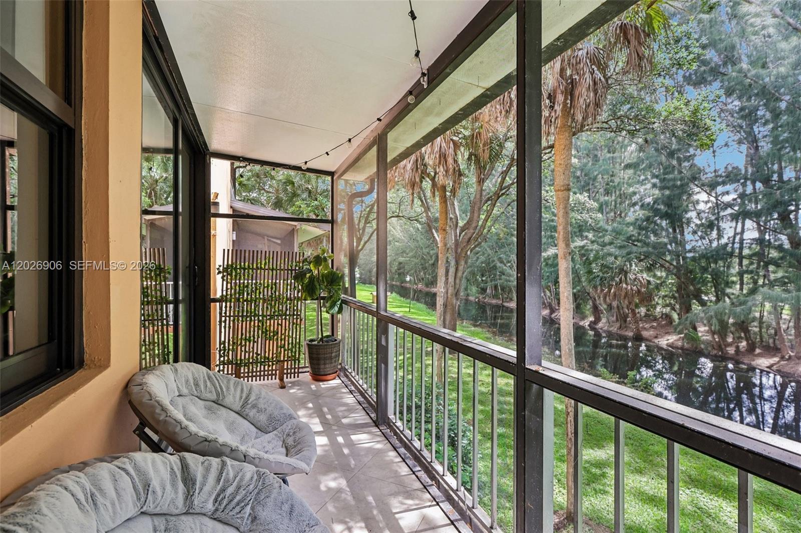 Spacious beautifully updated and maintained 2-bedroom, 2-bath condo located in the desirable Lago West community in Plantation. This bright and inviting unit features an open floor plan with abundant natural light, generously sized living and dining areas, and a screened balcony overlooking peaceful canal and golf course views. The updated kitchen offers modern cabinetry, quartz countertops, backsplash, and newer Stainless Steel appliances, making it perfect for everyday living and entertaining. The large primary suite includes a walk-in closet, an additional custom wall to wall closet and updated private bathroom, while the split-bedroom layout provides added comfort and privacy for guests or family members.

Additional features include impact windows and doors, tile and carpet flooring, newer A/C and water heater, ample storage space, and in-unit washer and dryer. Residents enjoy access to resort-style amenities including a community pool, clubhouse, fitness center, tennis courts, walking paths, and beautifully maintained grounds. Conveniently located near shopping centers, restaurants, parks, schools, Sawgrass Mills Mall, and major highways for easy commuting throughout South Florida.

Perfect opportunity for year-round living, seasonal residence, or investment property in one of Plantation’s most convenient and established communities. Move-in ready and easy to show.