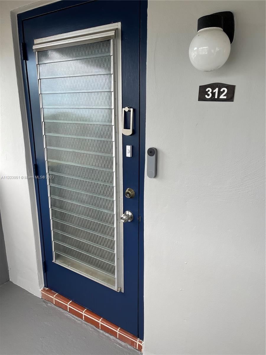 Beautiful move-in corner unit located in a quiet residential community in Margate. Bright with natural light including a cozy sun room encased by impact glass windows. The unit features wood and tile floors, and A/C installed in 2020. Several practical and desirable built-ins are added, in addition to separate assigned personal storage and bicycle storage. Each unit has an assigned parking space as well as access to  numerous available guest parking spaces. The community provides a clubhouse, library, gym, billiard room and heated pool. It is close to shopping malls, restaurants, houses of worship. It is an over 55 community which requires 700+ credit score.