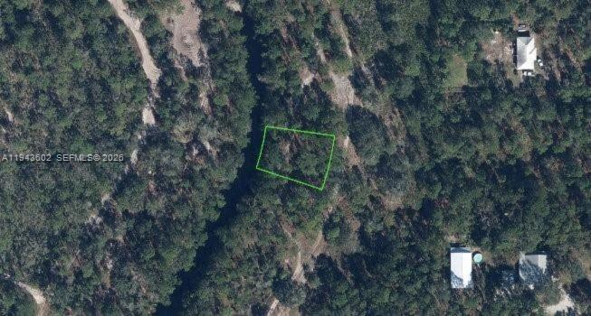 Residential-zoned vacant lot in Sebring, Florida, located in unincorporated Highlands County. This 11,125 SF parcel is situated in an up-and-coming area near schools, shopping, restaurants, and grocery stores, offering a great opportunity to build in Central Florida. Buyer to verify zoning, utilities, and buildability with Highlands County.