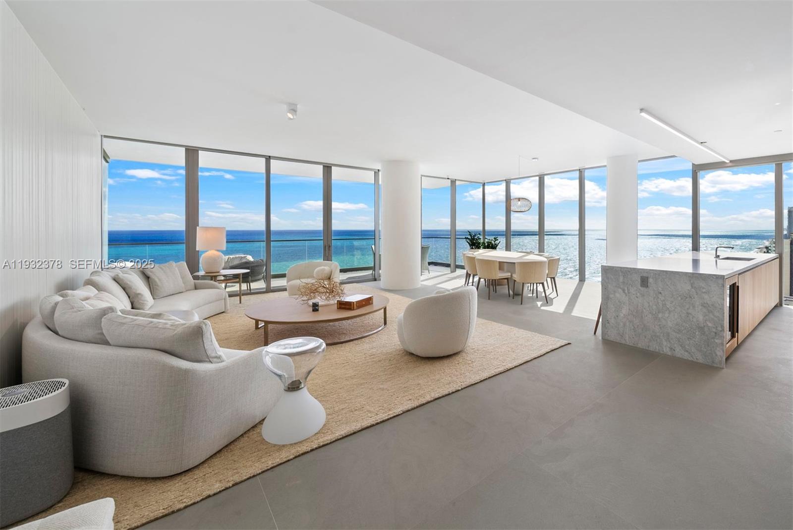 Indulgent, turn-key oceanfront residence offering breathtaking sunrises over the ocean and golden sunsets over the intracoastal waterway. Fully furnished with refined Artefacto furniture, this half-floor, 3-bed, 3.5-bath condo welcomes you via private, facial-recognition elevator, soaring 10-ft ceilings, and elegant Serena stone floors. Surrounded by tranquil blue ocean, the living room features a sleek Boffi kitchen with premium Gaggenau appliances and a terrace. Exceptional west-facing primary suite offers a private terrace, custom walk-in closets by B&B Italia, and a spa-inspired bath, sunlit media room, 3 parking spaces. Enjoy luxury boutique living with resort-style, beachfront amenities: beach club, 2 pools, fitness center, owner’s lounge with catering kitchen, spa pavilion, and more.
