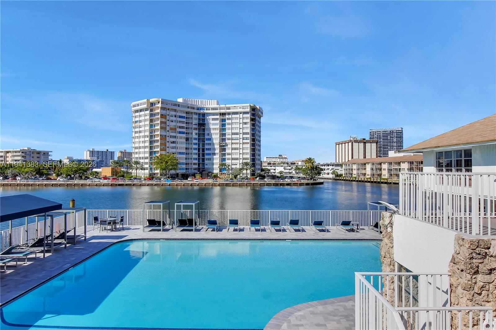 BEACH LOVERS DREAM COME TRUE! Have you always dreamed of stepping out your door and walking to the beach? Living steps from a serene canal with boats gently passing by? This stunning, fully remodeled condo is your waterfront paradise! Impeccably clean and move-in ready, this gem is just 2 minutes from beach access, where a beautiful, peaceful park awaits, perfect for morning strolls, picnics, or soaking in the ocean breeze. Enjoy resort-style amenities right at home:
A completely remodeled pool overlooking the tranquil canal—lounge while watching the boats glide by.
Quiet gym with inspiring canal views to keep you motivated.
Fun recreation: ping pong and pool tables.
Relaxing sauna and more!
