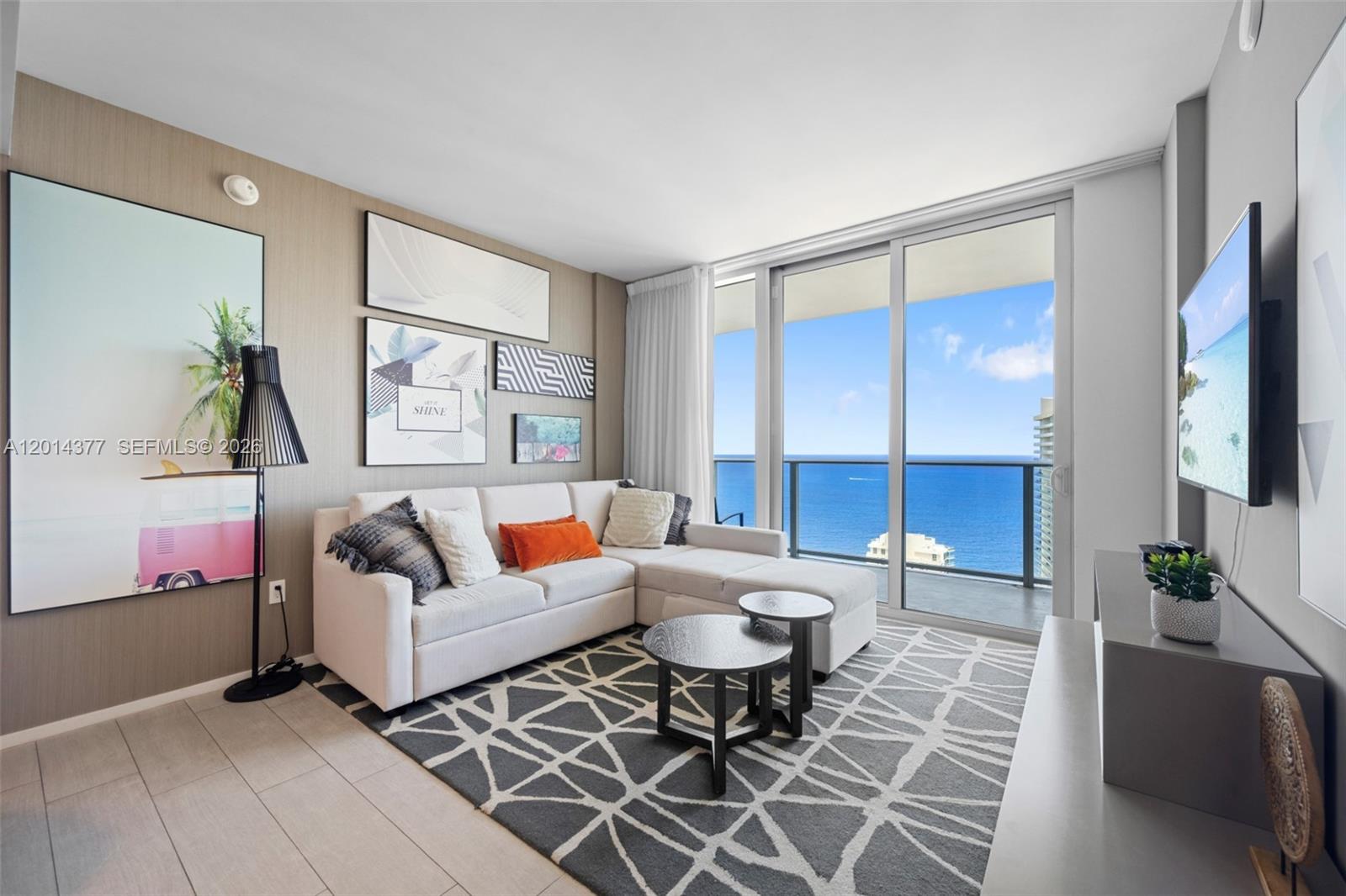 Positioned high on the 39th floor at hyde, this impeccably furnished 2-bedroom, 2-bath residence delivers the ultimate South Florida lifestyle with sweeping ocean and Intracoastal views from every angle. Thoughtfully designed with modern finishes, floor-to-ceiling glass, and an open-concept layout flooded with natural light, this turnkey residence is ready for immediate enjoyment or income-producing potential. The spacious split-bedroom floor plan offers privacy and comfort, while the oversized terrace creates the perfect backdrop for sunrise coffee or sunset cocktails above the coastline. Residents enjoy resort-style amenities including pool service, fitness center, spa, concierge, valet, and direct access to world-class dining and entertainment. Whether you’re seeking a luxury vacation home, full-time residence, or high-performing investment property, this sky-high retreat offers a rare blend of sophistication, flexibility, and unbeatable location just steps from the beach.