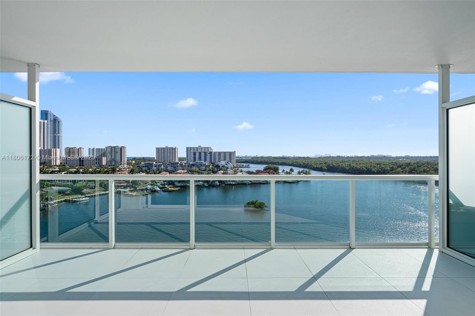 PRICED TO SELL! Luxury Living at 400 Sunny Isles! Step into elegance with this stunning 3 bedroom / 2 1/2 bath flow through residence. Enjoy breathtaking water views from every window! You will enjoy Sunrises and Sunsets! This spacious unit features floor-to-ceiling windows, an open concept layout and top of the line finishes through out. The modern kitchen is equipped with high end appliances and European cabinetry, perfect for both everyday living and entertaining. Located in a premier waterfront community and five-star amenities, including a state of the art fitness center, infinity edge pool, spa, tennis courts, and 24 hour bellman! Just minutes from the beach, Oleta River State Park and world class shopping and dining at Bal Harbour and Aventura Mall!