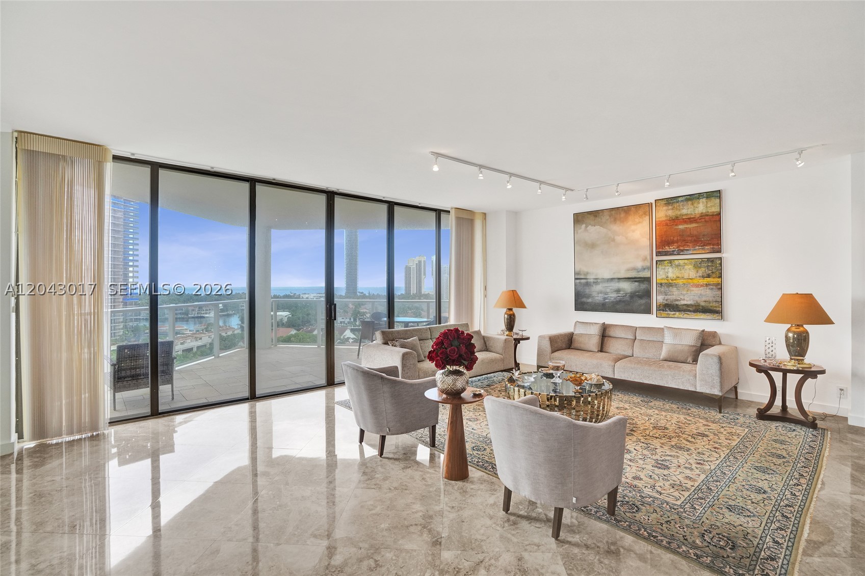 Waterfront living at Turnberry Marina Tower. This expansive 2,360 sq ft corner residence features 2 bedrooms, 2.5 baths, and walls of floor-to-ceiling glass framing stunning panoramic vistas of the Intracoastal Waterway. Sophisticated living and seamless entertaining, the open-concept floor plan flows through generous living and dining spaces, private balconies, and two well-proportioned bedroom suites. Set within a full-service building complete with valet parking, concierge service, a swimming pool, fitness center, and more. Perfectly positioned just moments from Aventura Mall, world-class dining, and beautiful beaches.