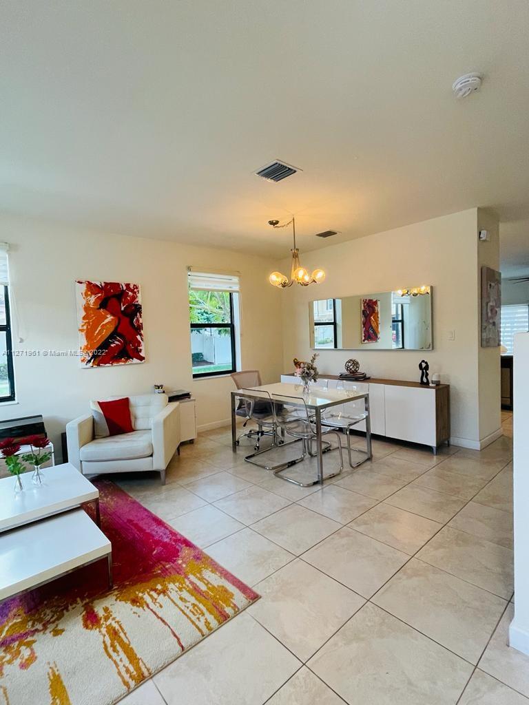Amaizing townhouse with 3 Bedrooms, 2.5 Bathrooms in Bonterra, a quiet gated community in Hialeah Gardens. This well-maintained property features granite style countertop, large wood cabinets and stainless steel appliances, tile floors on the first floor and carpet on the second floor. Washer and Dryer upstairs. Master bedroom with walk-in closet. Spacious and cozy private patio perfect for BBQ and enjoy. Residents will have access to a great clubhouse with community pool, child play ground, kitchen facilities, full equipped gym and more. Great location, close to supermarkets, gas station, schools and easy access to main highways! is a Must to see...
