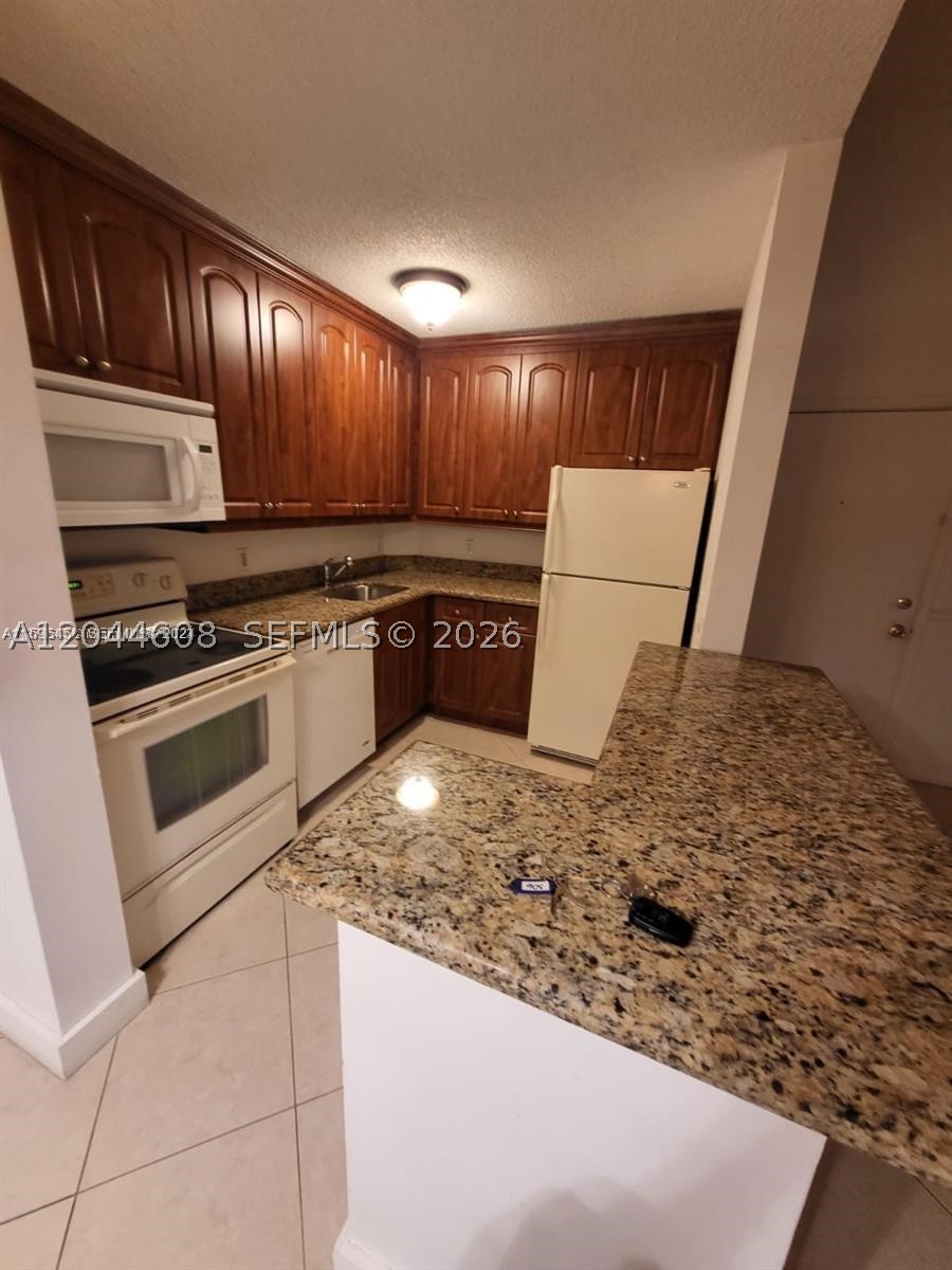 LAKES OF JACARANDA CONDO - Residential Lease