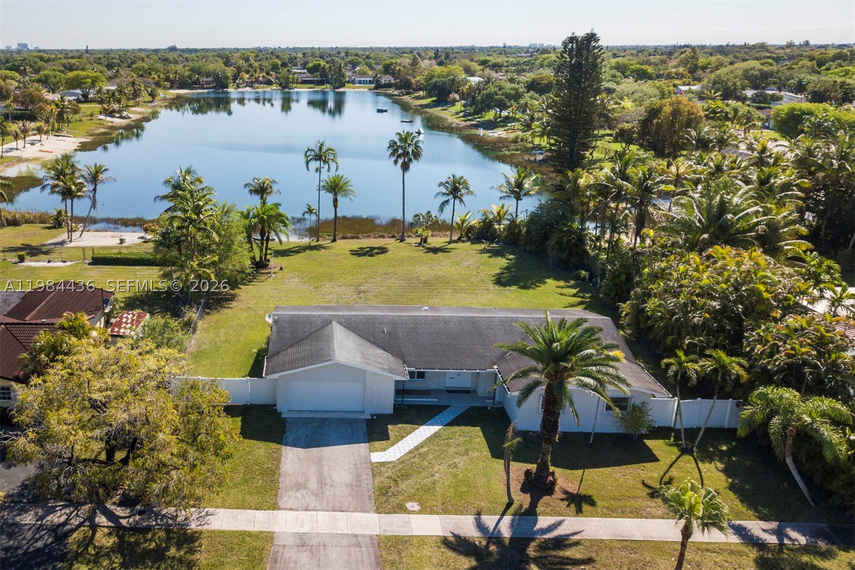 BEAUTIFUL, RENOVATED OAKLAND ACRES EMPIRE MODEL LOCATED ON LAKE OKLAND. THIS PROPERTY SITS ON A 40,786.92 LOT ON LAKE OAKLAND IN THE COVETED PINE SHORE COMMUNITY. NEW KITCHEN AND BATHROOMS, THE ROOF IS 10 YEARS OLD. A/C IS LESS THAN 5 YEARS OLD. HIGH IMPACT WINDOWS IN BACK AND ACCORDIAN SHUTTERS ON ALL OTHER WINDOWS.