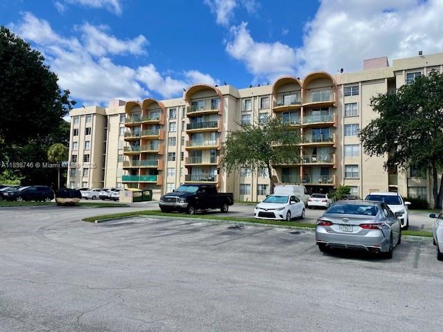 Spacious & Bright condo at The Fountains in the community of Fontainebleau.  This unit offers a large
double balcony with access from the living room & the primary bedroom.  PROPERTY FEATURES:
a large walk in closet & wall to wall closet-large living room & primary bedroom--eat in kitchen area--
laundry facility directly outside the unit.
Community offers a large pool area--tennis court--club house for entertaining--gym--plenty of guest parking.  SELLER WILL PAY FOR THE PENDING SPECIAL ASSESSMENT.