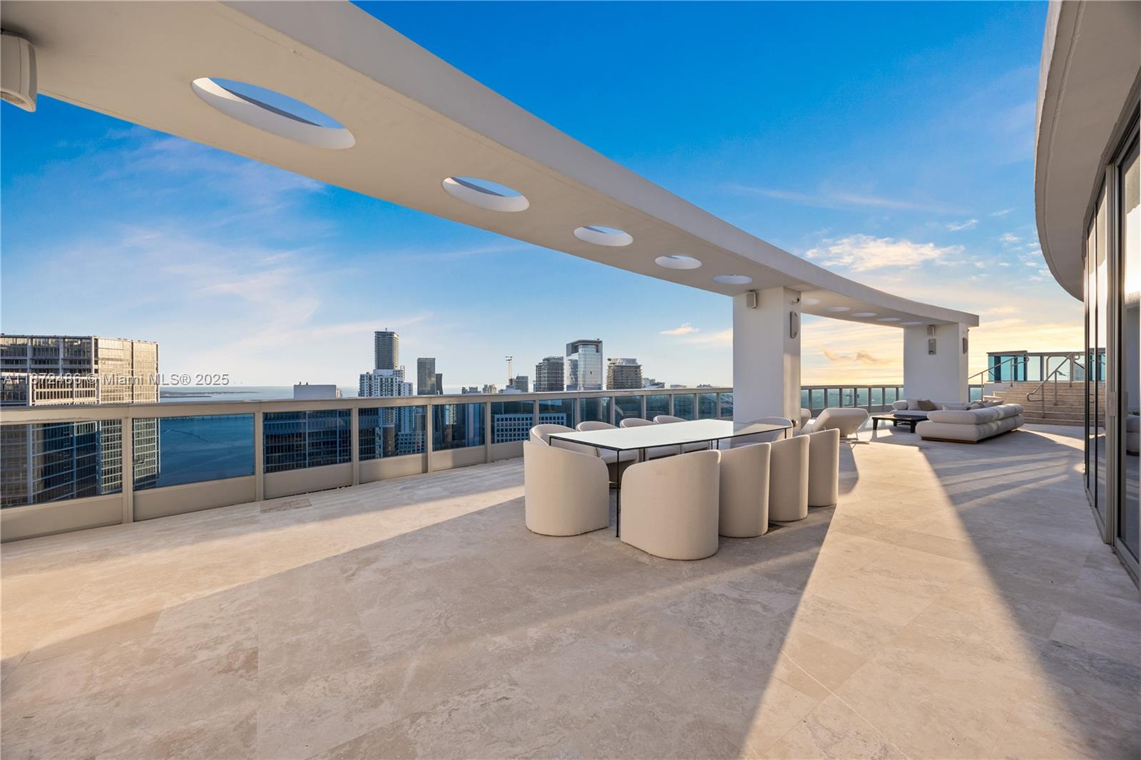 Spectacular 2-story PH at Epic Residences offering over 4,300SF of interior space plus over 3,000 SF of private terraces. This rare 3BR/5.5BA residence with additional living area on second level features a private interior elevator, gourmet kitchen with Miele appliances, Sub-Zero refrigerator, & marble countertops. Primary suite includes dual walk-in closets & spa-style bath.Enjoy private rooftop terrace with Jacuzzi & panoramic views of Biscayne Bay, Miami River, & city skyline. On second level is entertainment lounge with full bar, 500-bottle wine cellar & full BA.Unit has 4 assigned parkings.Epic Residences offers 5 resort-style pools, spa, fitness,24H concierge, valet, security,& fine dining at Zuma, Area 31. Prime Downtown location near Brickell, Whole Foods, Bayfront Park, & I95. Furnishings by Vesta.