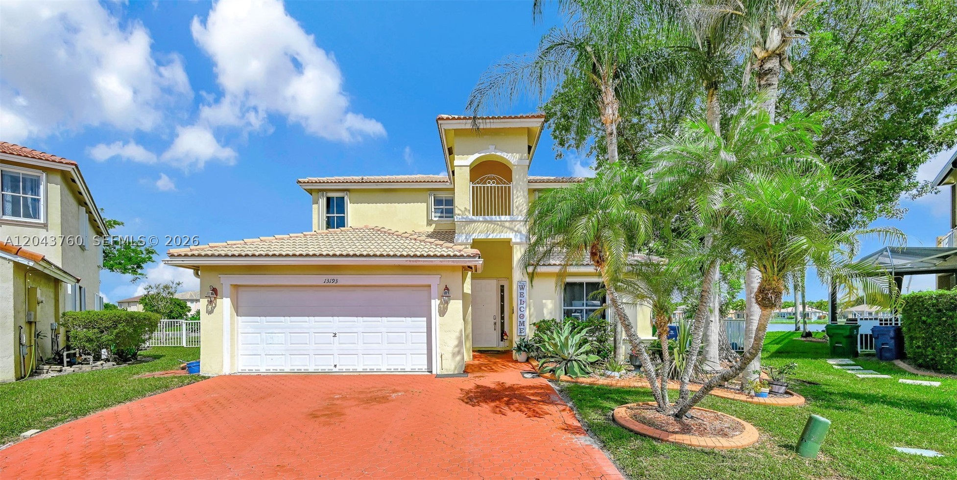 Stunning lakefront residence located on a private cul-de-sac in the highly desirable Monarch Lakes community of Miramar. Offering over 3,000 sq ft of living space, this spacious two-story home features 6 bedrooms, 3 full bathrooms, a den/library, formal living and dining areas, and a two-car garage.

The primary suite includes access to a private second-floor terrace overlooking the lake, creating the perfect retreat to enjoy serene waterfront views. Situated on an oversized, nearly 10,000 sq ft lot, the property boasts approximately 120 feet of lake frontage, providing rare panoramic water views and exceptional privacy.

Conveniently located just one block from the community entrance and residents' pool, this home offers both comfort and accessibility in one of Miramar's most sought-after neighborhoods.

Please note that select images have been digitally staged for illustrative purposes. All photographs accurately represent the home's dimensions, finishes, and architectural features. Seller is offering closing cost credits for qualified, serious buyers.